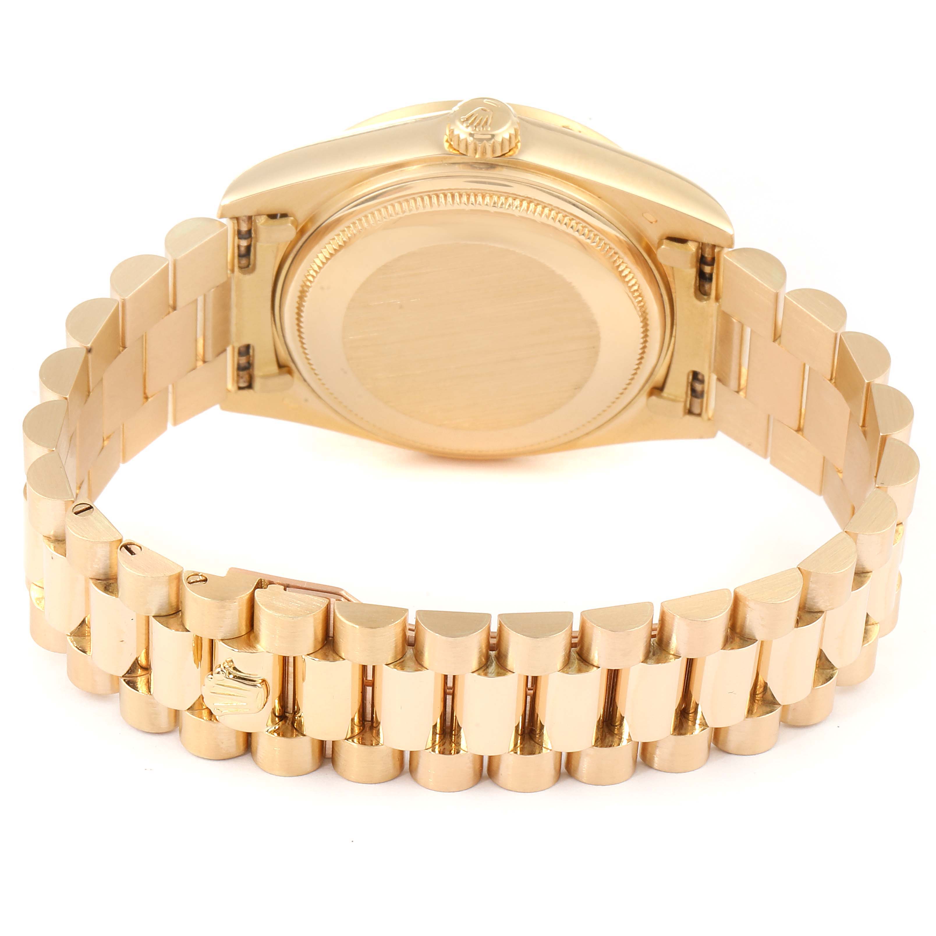 This image shows the backside and bracelet of a Rolex President 18148 Men's Yellow Gold Champagne Dial 18148 Men's Yellow Gold Champagne Dial model watch in a gold finish.