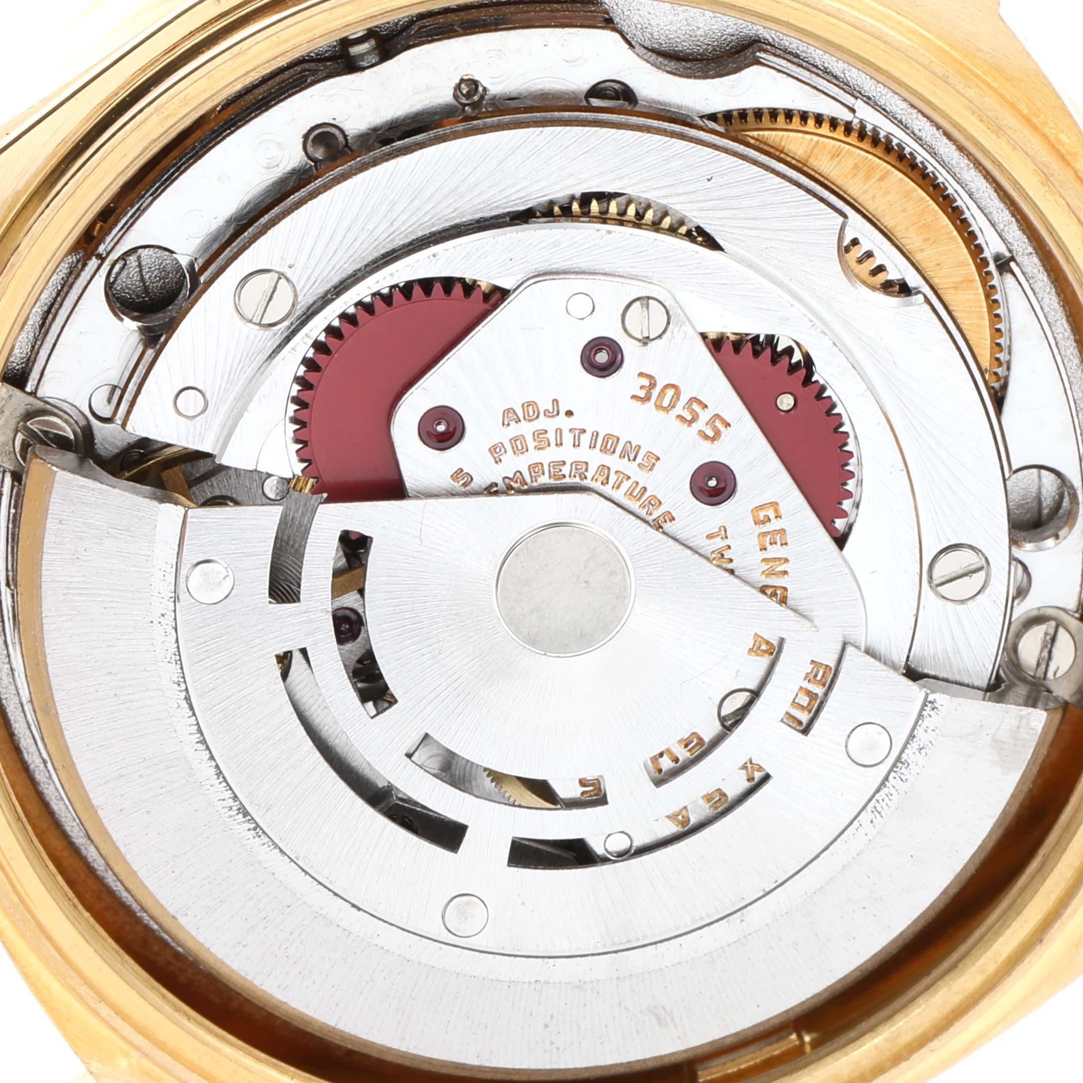 This image shows the internal movement mechanism of a Rolex President 18148 Men's Yellow Gold Champagne Dial 18148 Men's Yellow Gold Champagne Dial model watch, highlighting gears and components.