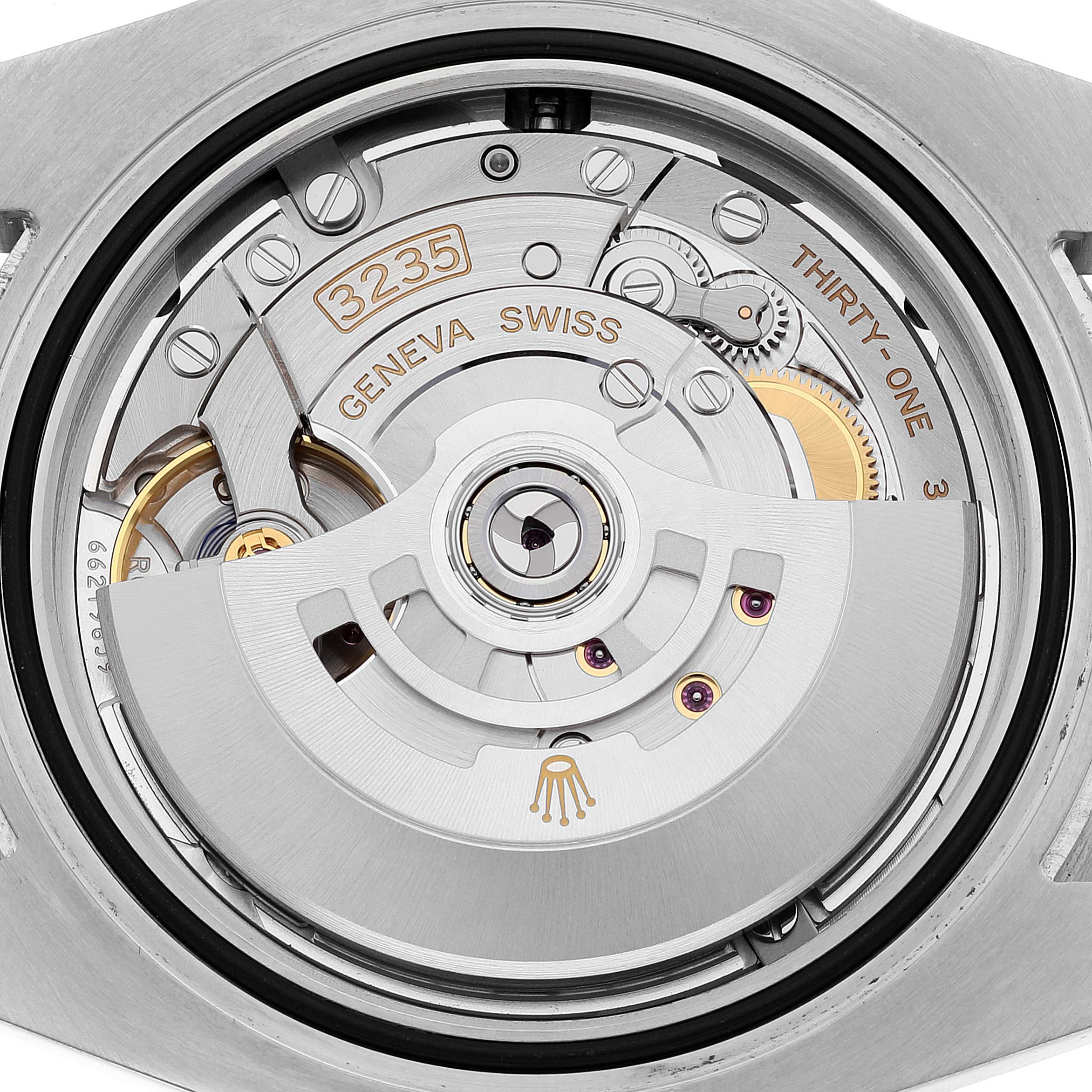 This is a close-up of the movement inside a Rolex Submariner 126610 Men's Stainless Steel Black Dial 126610 Men's Stainless Steel Black Dial watch, showing the intricate mechanical parts.