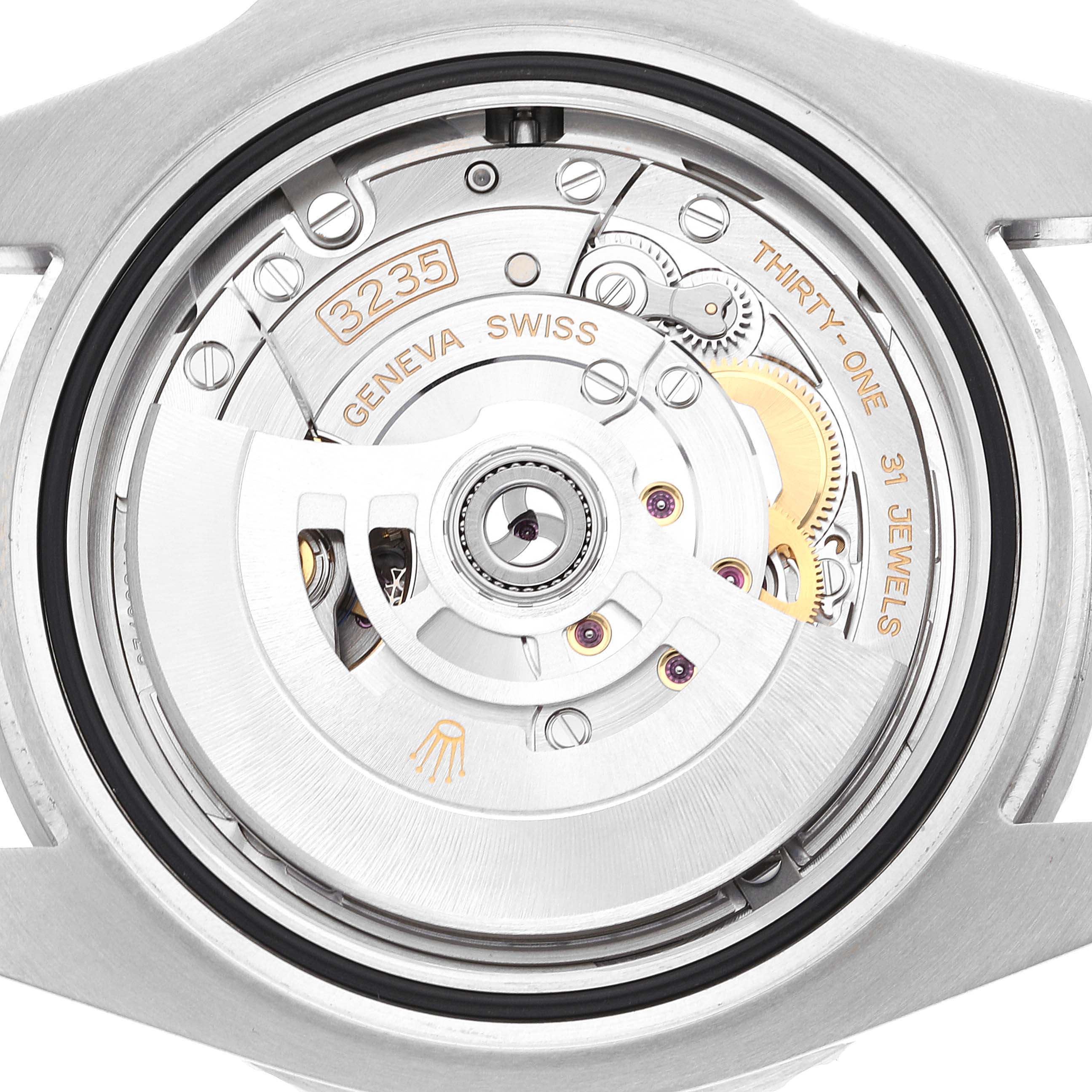 This image shows the intricate inner workings of a Rolex Submariner 126610 Men
s Stainless Steel Black Dial 126610 Men
s Stainless Steel Black Dial watch, viewed from the back.