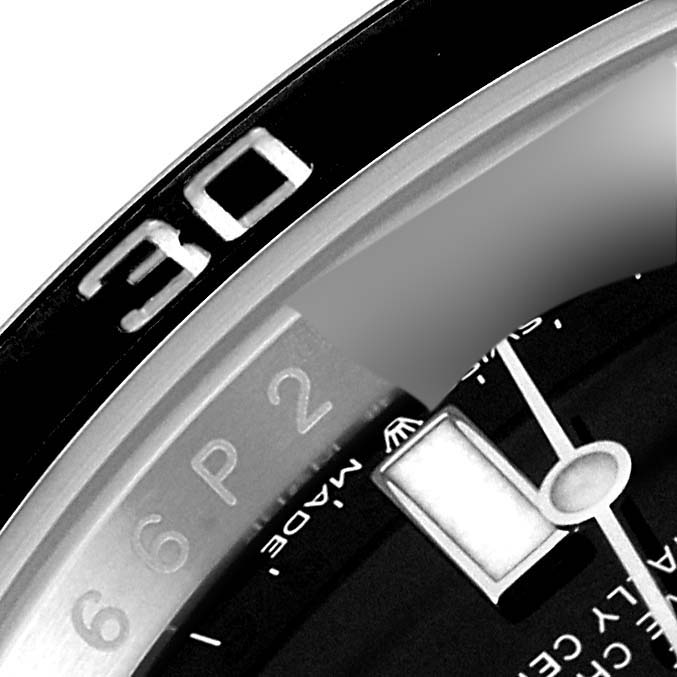 The image shows a close-up of the bezel and part of the dial and hour hand of a Rolex Submariner 126610 Men
s Stainless Steel Black Dial 126610 Men
s Stainless Steel Black Dial watch.