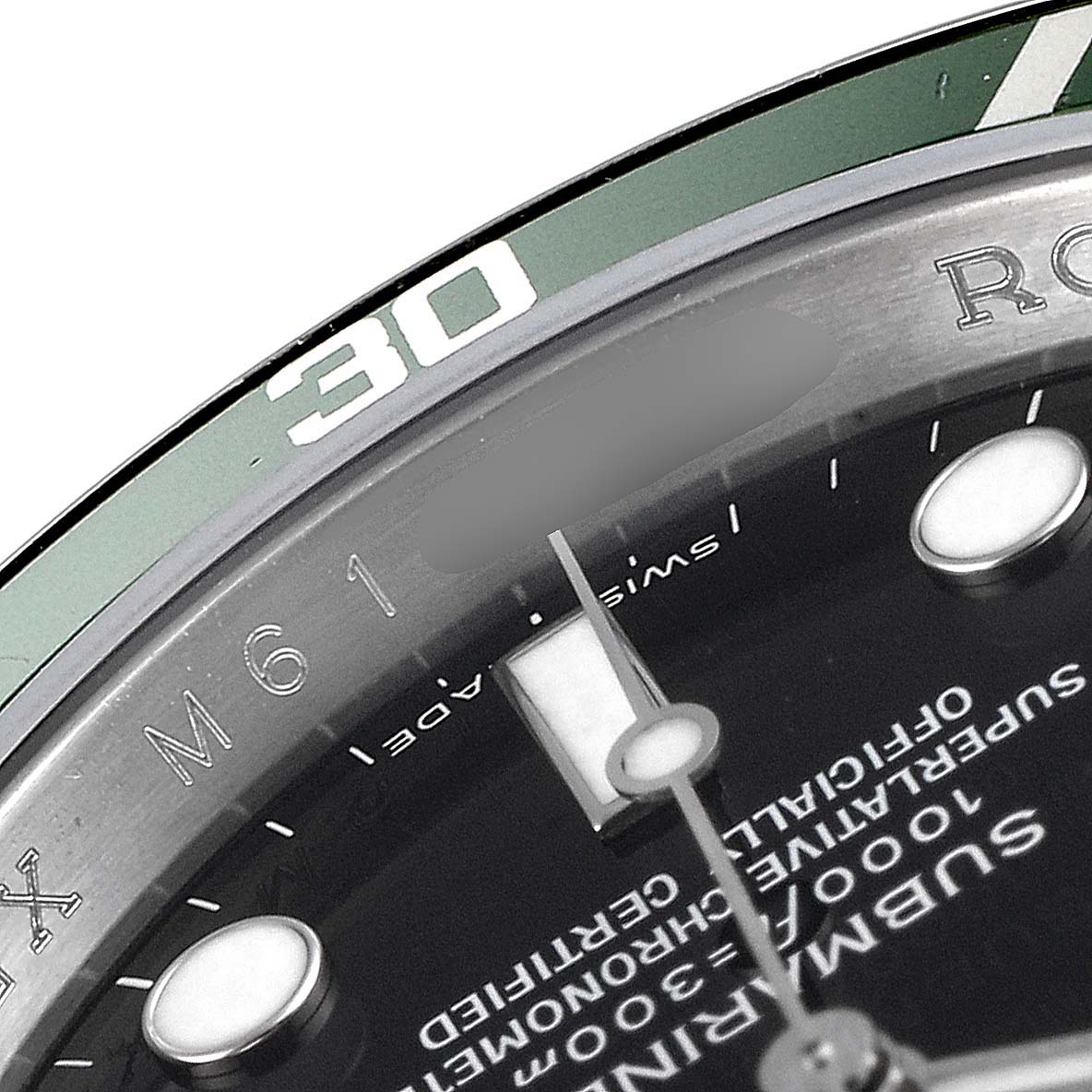The image shows a close-up of the bezel, crystal, and part of the dial of a Rolex Submariner 16610LV Men's Stainless Steel Black Dial 16610LV Men's Stainless Steel Black Dial watch.