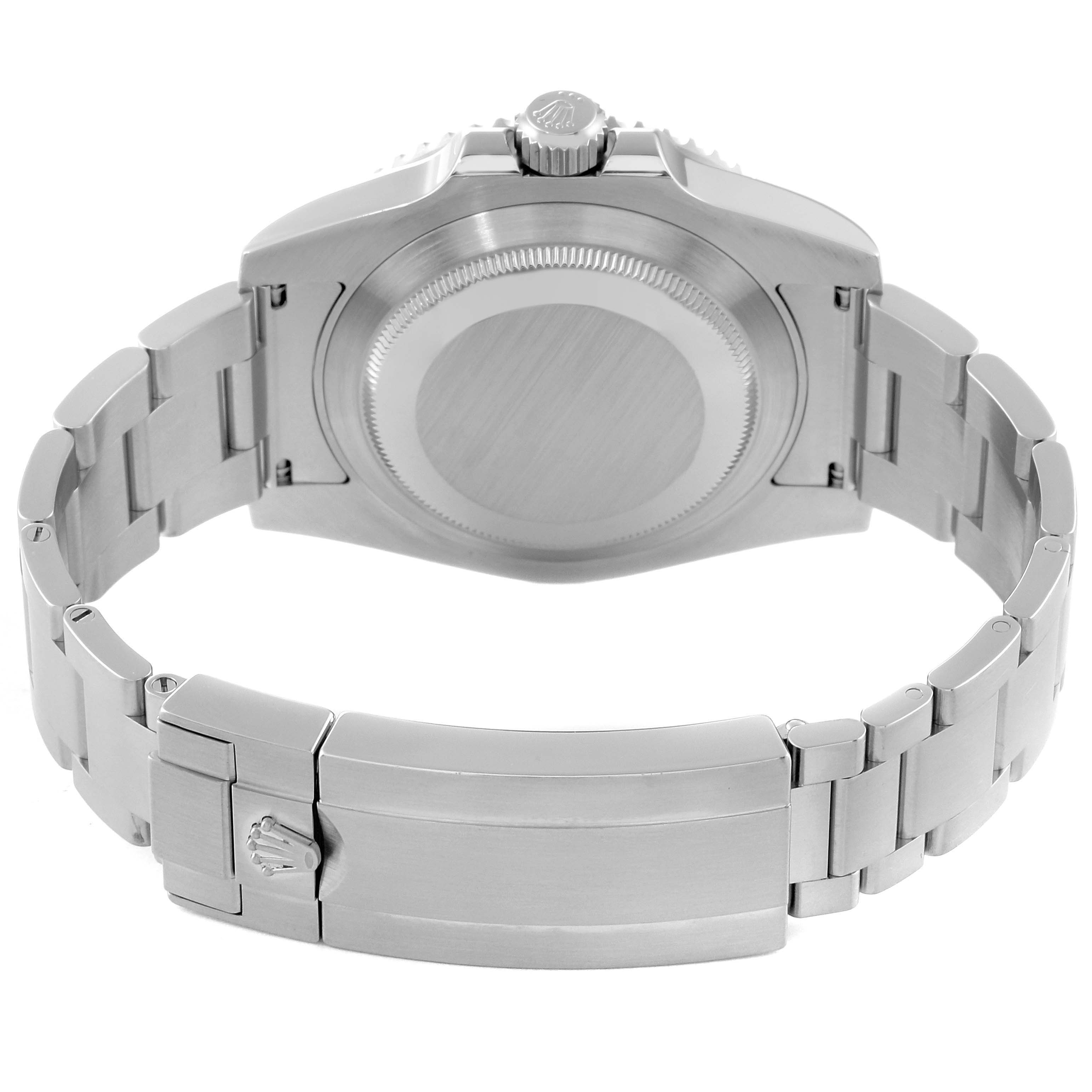 The image shows the back case and clasp of a Rolex Submariner 116610LV Men's Stainless Steel Green Dial 116610LV Men's Stainless Steel Green Dial watch at a rear angle.