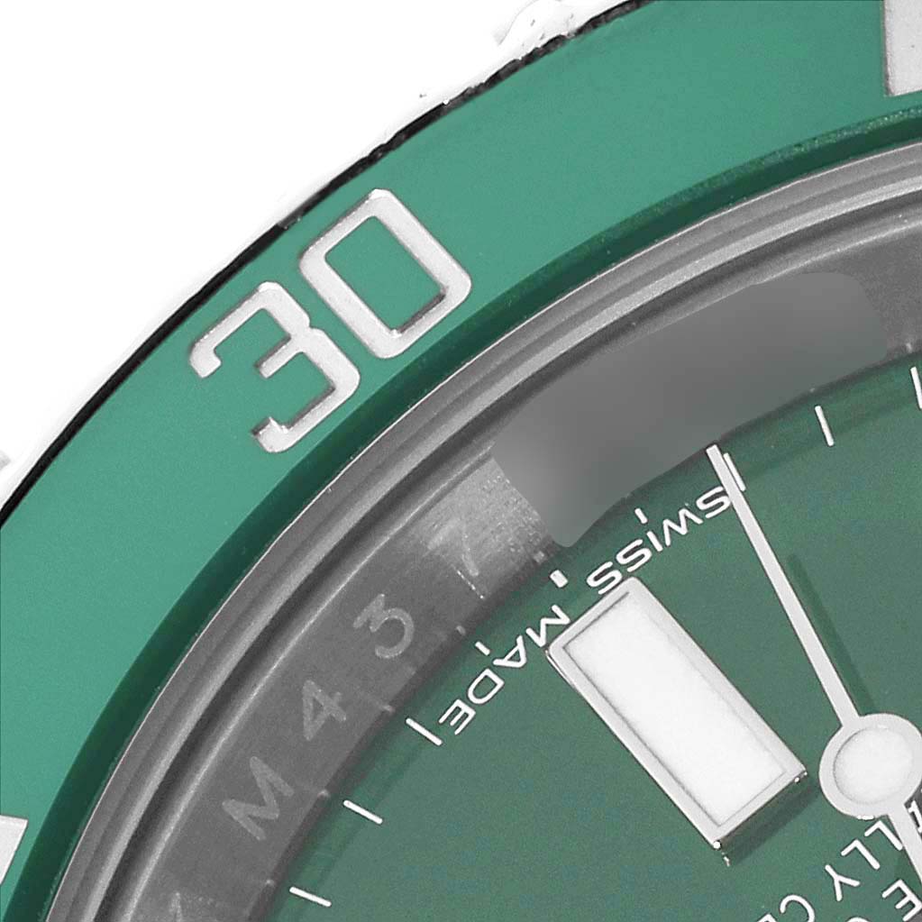 This close-up angle shows the green bezel and part of the dial of the Rolex Submariner 116610LV Men's Stainless Steel Green Dial 116610LV Men's Stainless Steel Green Dial watch.
