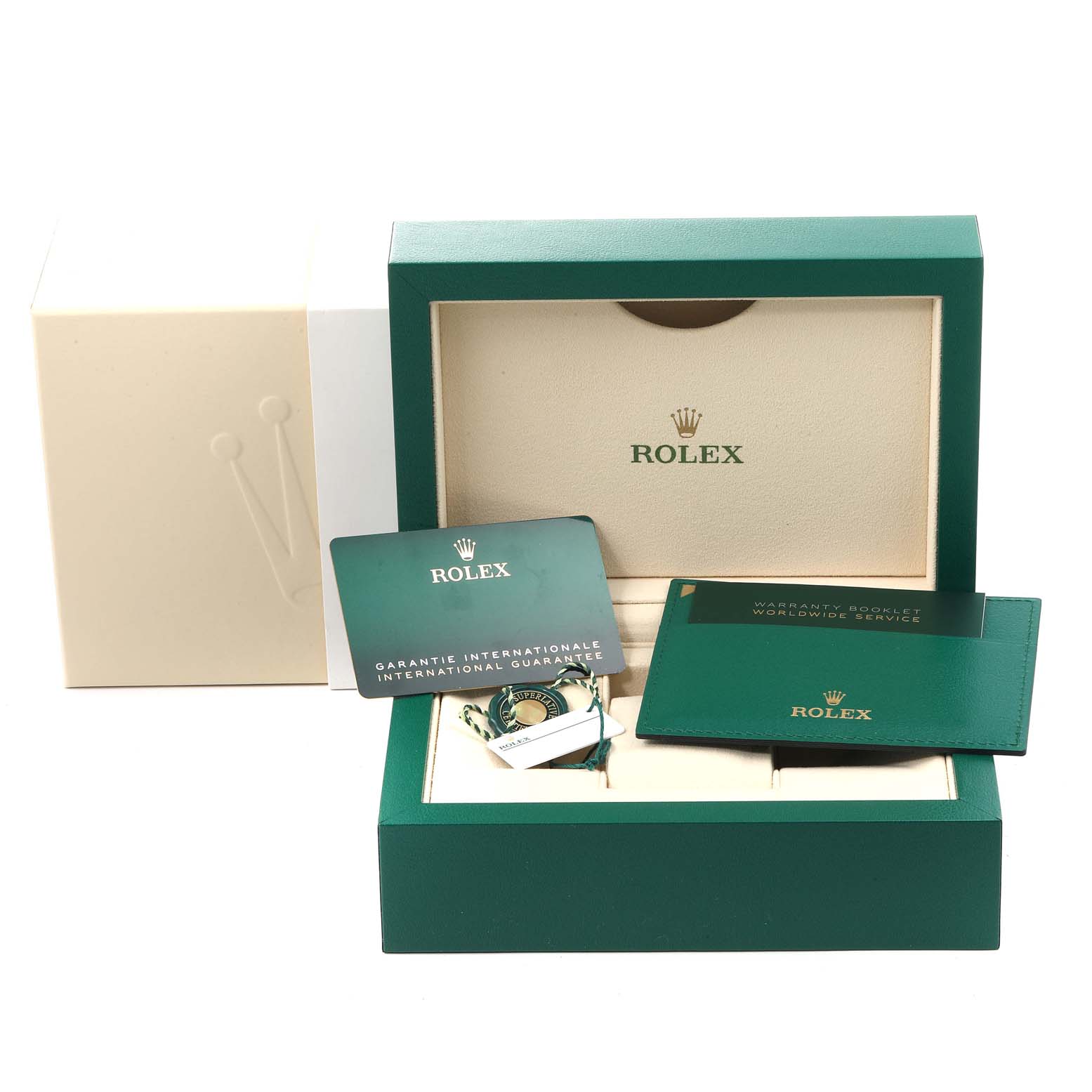The image shows the box and accessories for a Rolex Submariner 124060 Men's Stainless Steel Black Dial 124060 Men's Stainless Steel Black Dial, including the international guarantee card and warranty booklet.