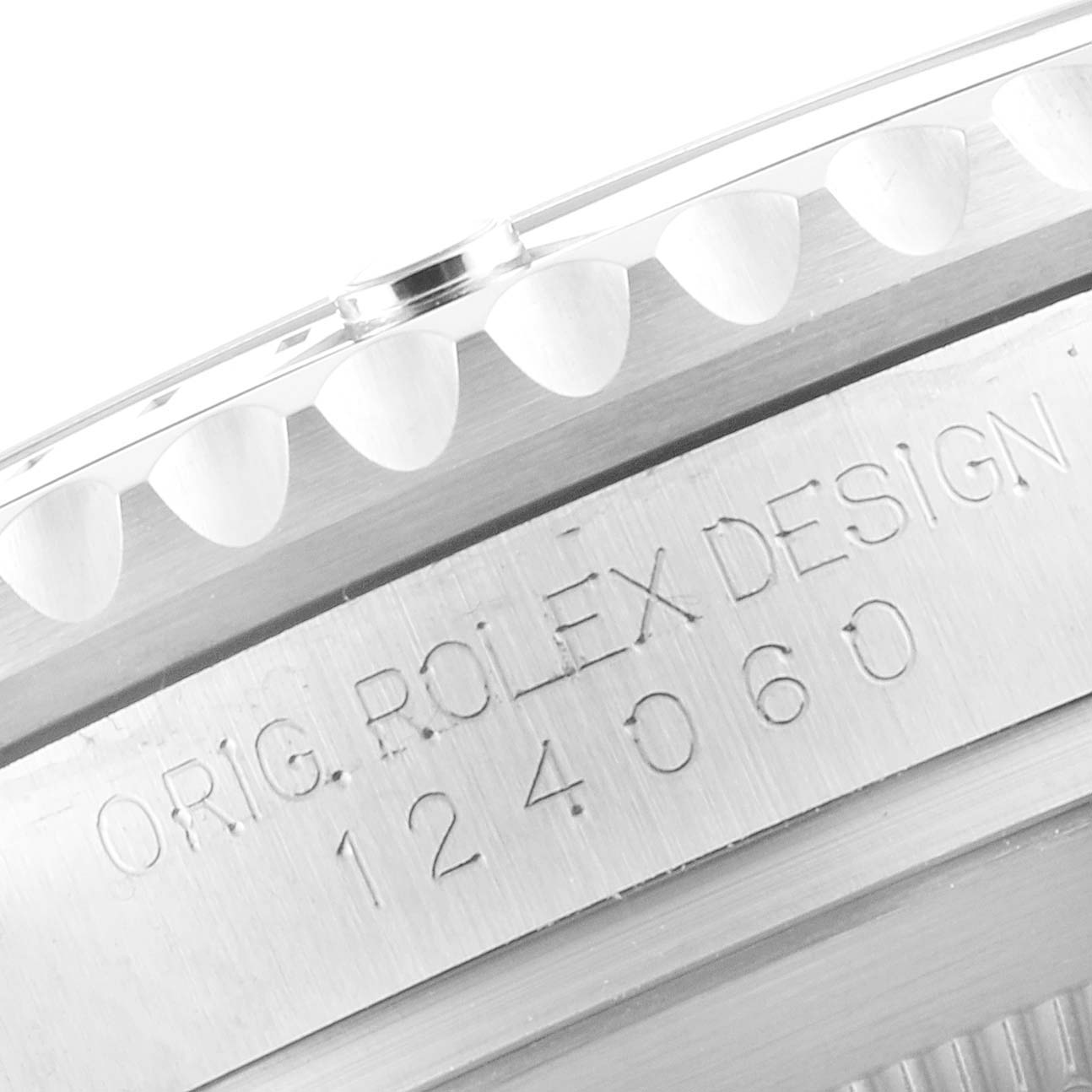 This image shows a close-up of the side engraving and bezel edge of the Rolex Submariner 124060 Men's Stainless Steel Black Dial 124060 Men's Stainless Steel Black Dial model.
