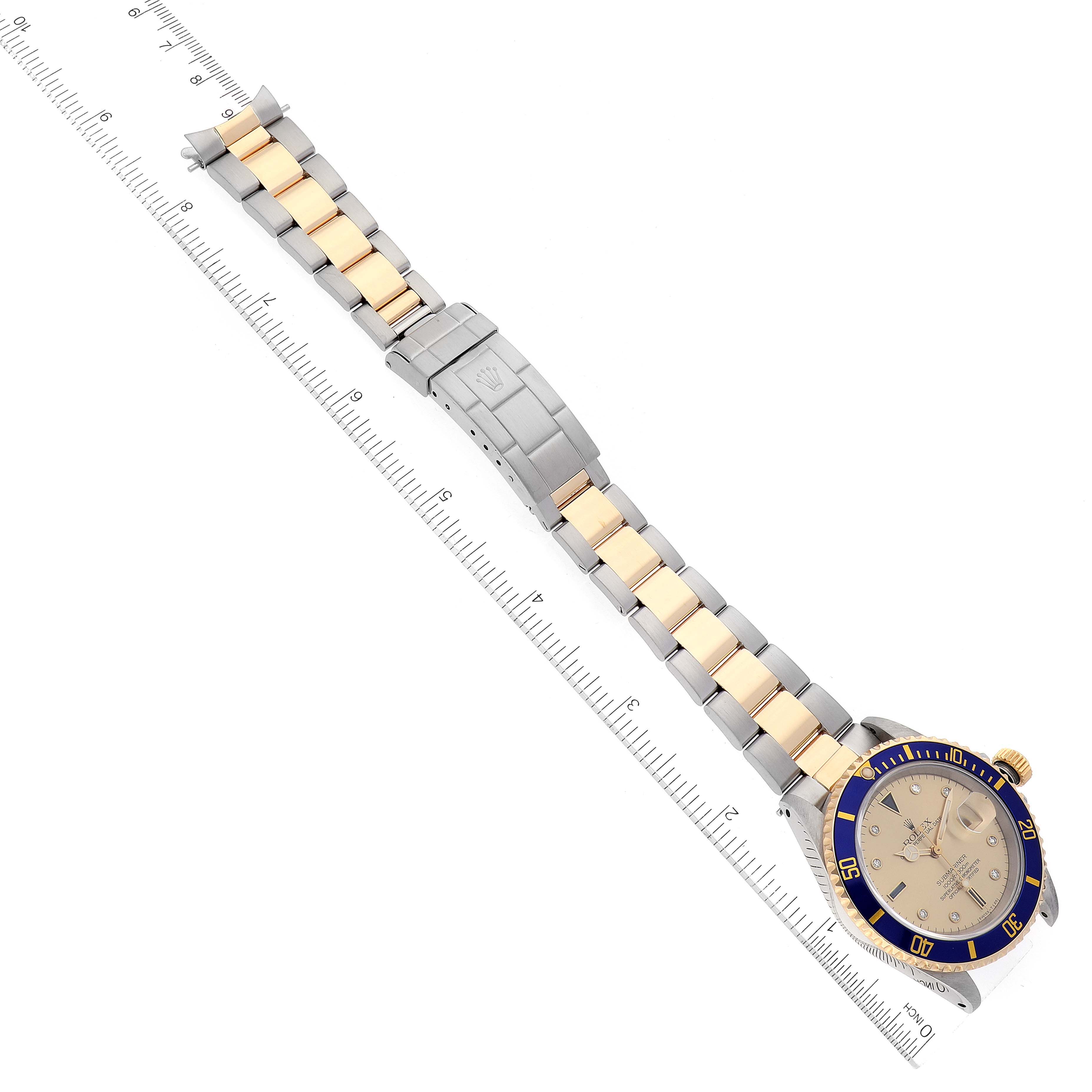 The image shows a top-down view of a Rolex Submariner 16613 Men's Steel and Gold (two tone) Champagne Dial 16613 Men's Steel and Gold (two tone) Champagne Dial watch, displaying the bracelet, case, bezel, and part of the crown.