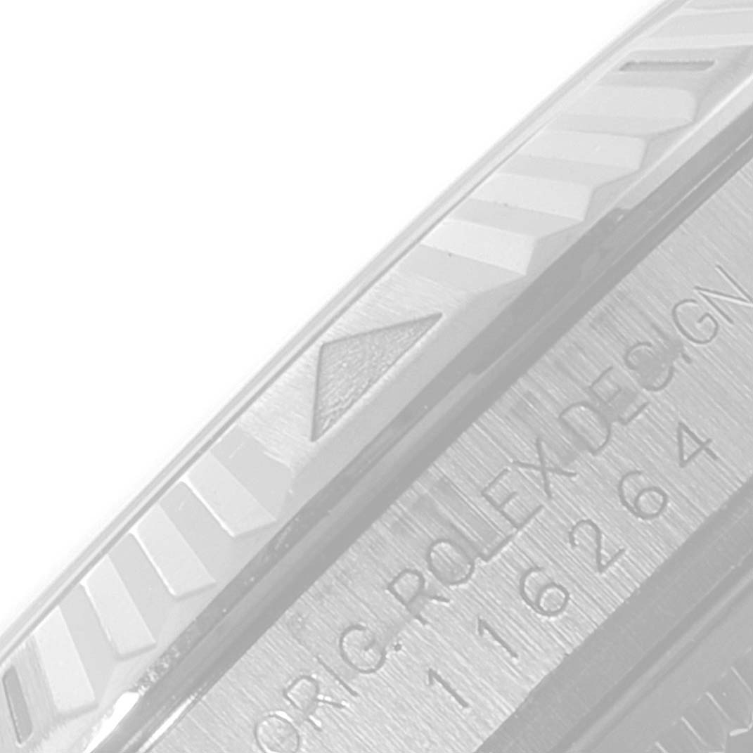 The image shows a close-up angle of the bezel and engraved side of a Rolex Turn-o-Graph 116264 Men
s Stainless Steel White Dial 116264 Men
s Stainless Steel White Dial watch.