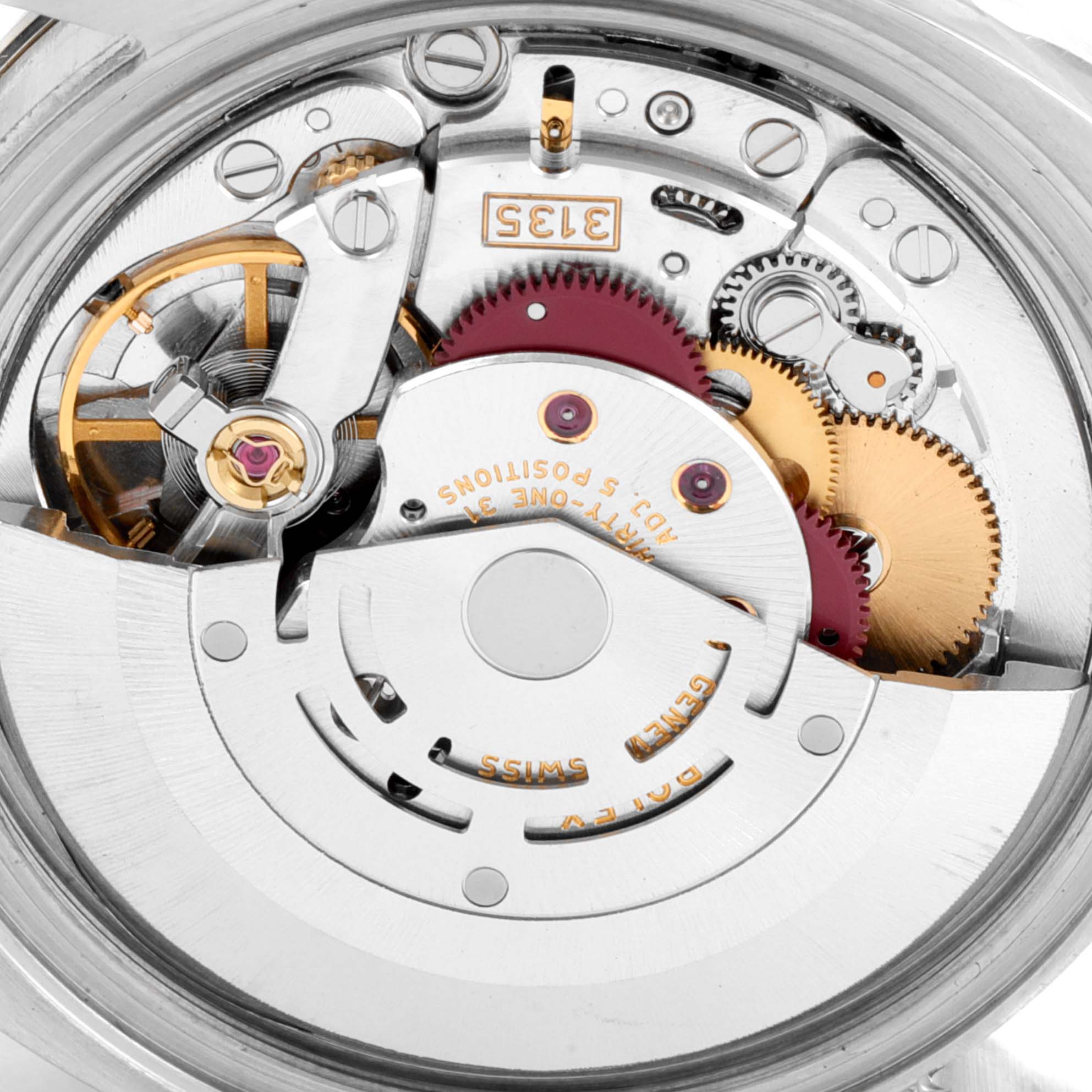 This image shows a close-up view of the movement mechanism inside the Rolex Turn-o-Graph 116264 Men
s Stainless Steel White Dial 116264 Men
s Stainless Steel White Dial watch, including gears and components.