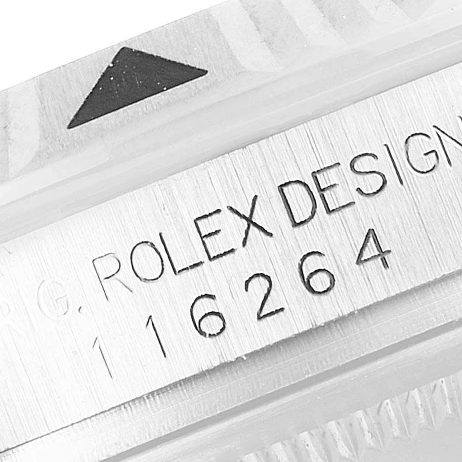 This image shows a close-up of the serial number and bezel of a Rolex Turn-o-Graph 116264 Men
s Stainless Steel White Dial 116264 Men
s Stainless Steel White Dial watch.