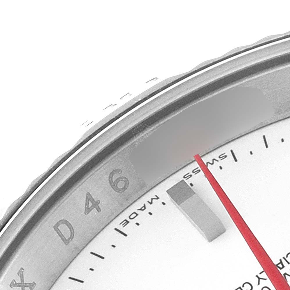 This close-up image of the Rolex Turn-o-Graph 116264 Men
s Stainless Steel White Dial 116264 Men
s Stainless Steel White Dial watch shows the bezel, part of the dial, and the red seconds hand.