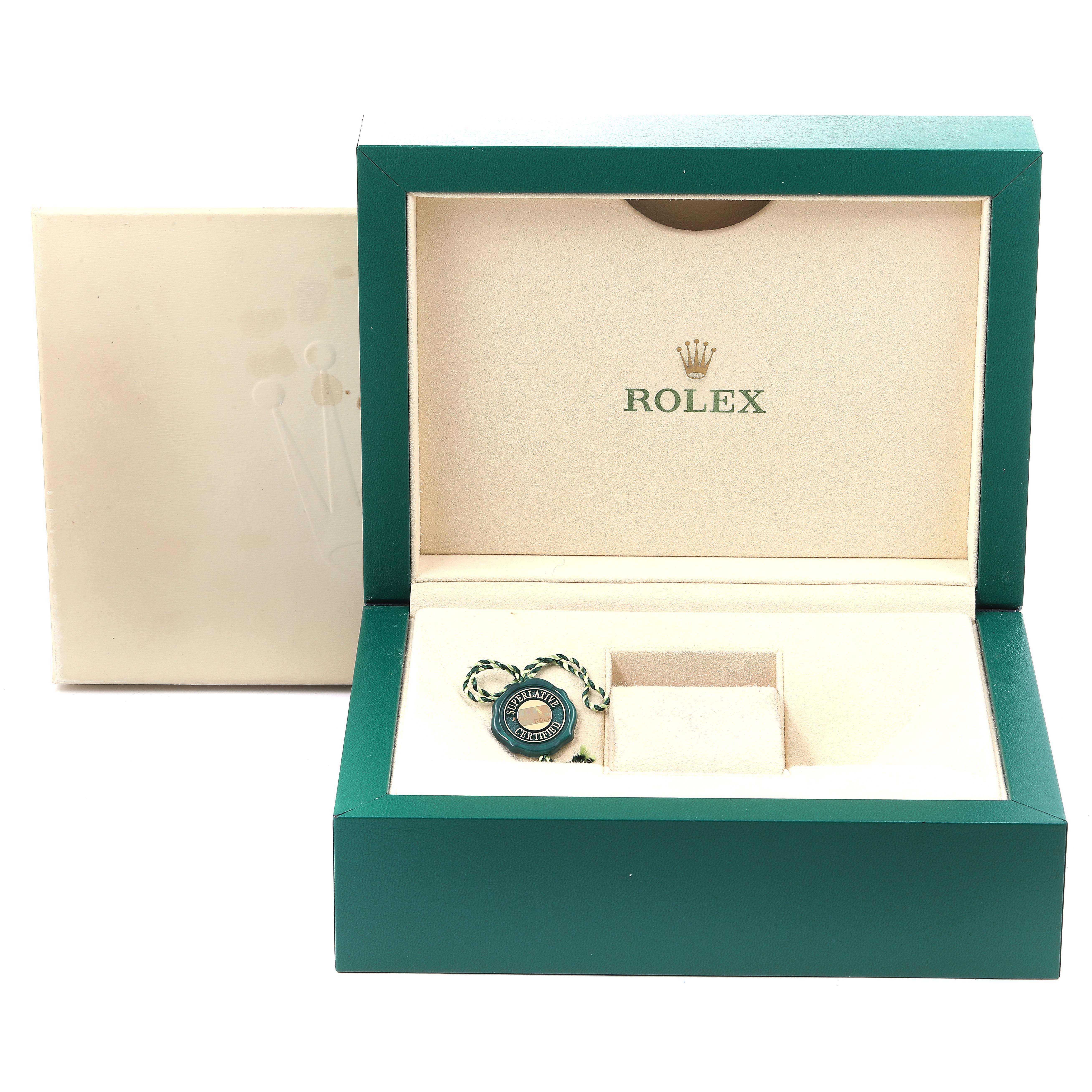The image shows an open green Rolex box with inner compartments, designed for the Yacht-Master model.