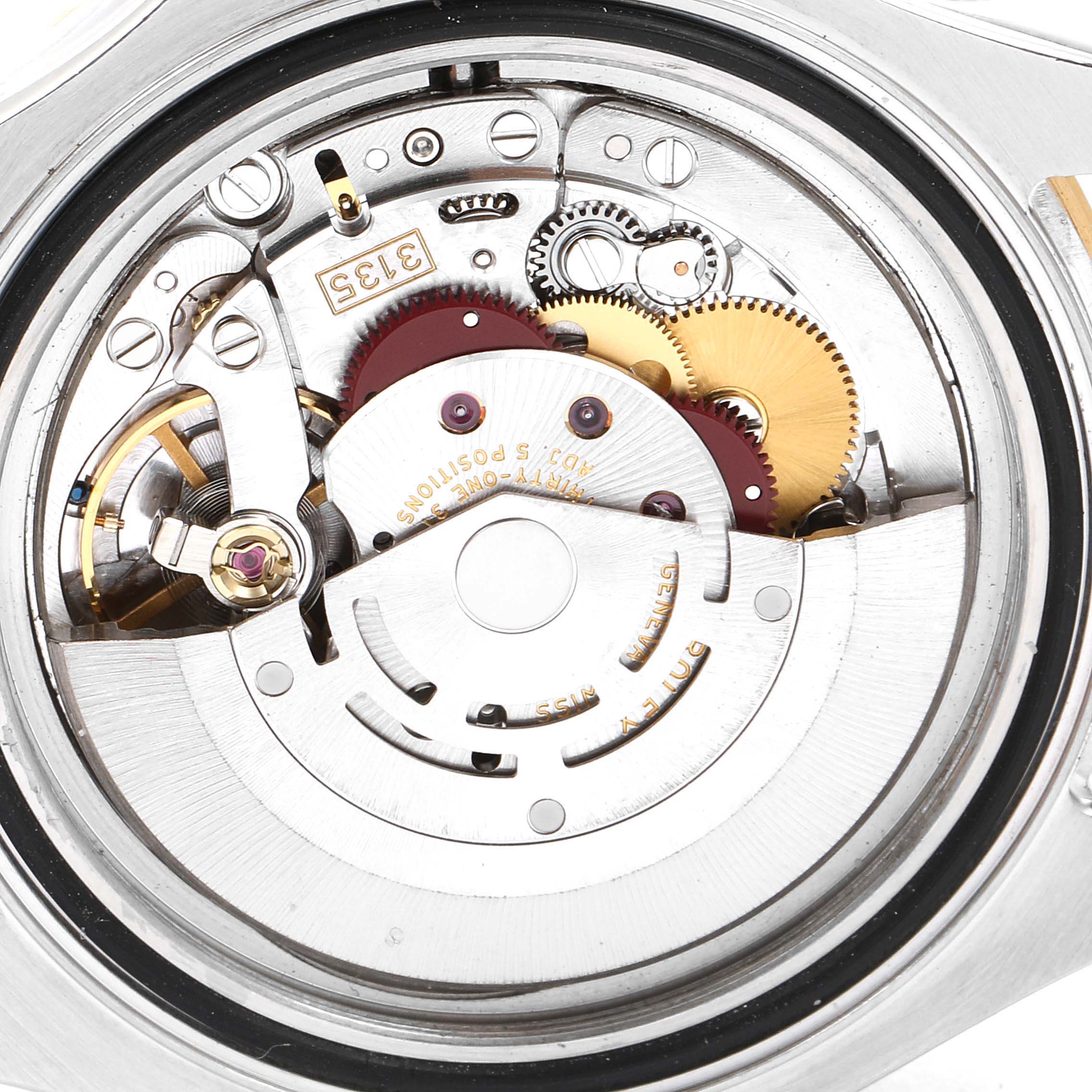 The image shows a close-up of the internal mechanism and movement of a Rolex Yacht-Master 16623 Men's Steel and Gold (two tone) White Dial 16623 Men's Steel and Gold (two tone) White Dial watch, highlighting gears and components.