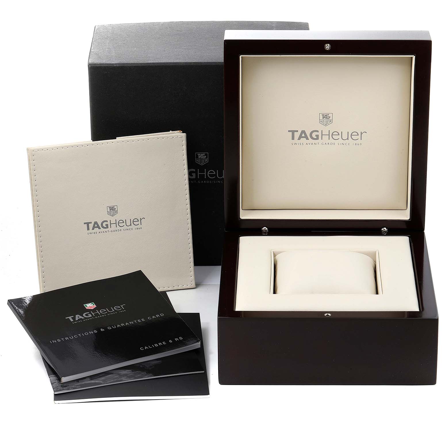 The image shows the packaging and accessories of a Tag Heuer Carrera CAR5A8H.FC6448 Men's Titanium Blue Dial CAR5A8H.FC6448 Men's Titanium Blue Dial watch, including a box, manuals, and guarantee card holder.