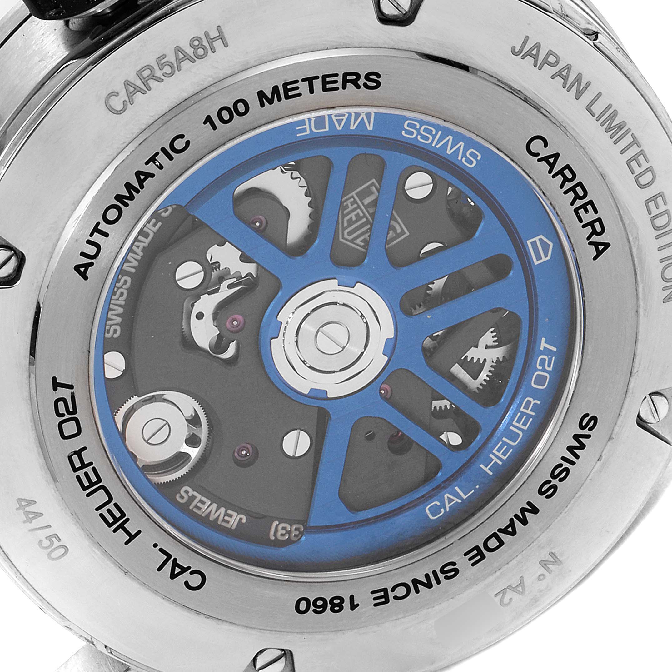 The image shows the back of a Tag Heuer Carrera CAR5A8H.FC6448 Men's Titanium Blue Dial CAR5A8H.FC6448 Men's Titanium Blue Dial watch, highlighting its mechanical movement and engravings.