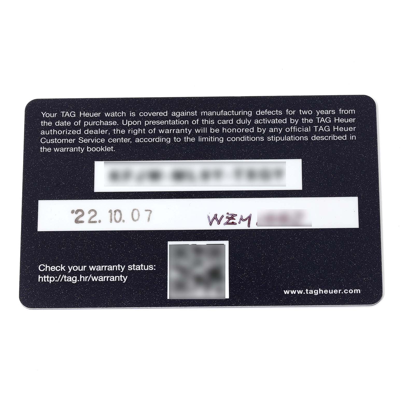 This image shows a TAG Heuer warranty card for the Monaco model, viewed from above.