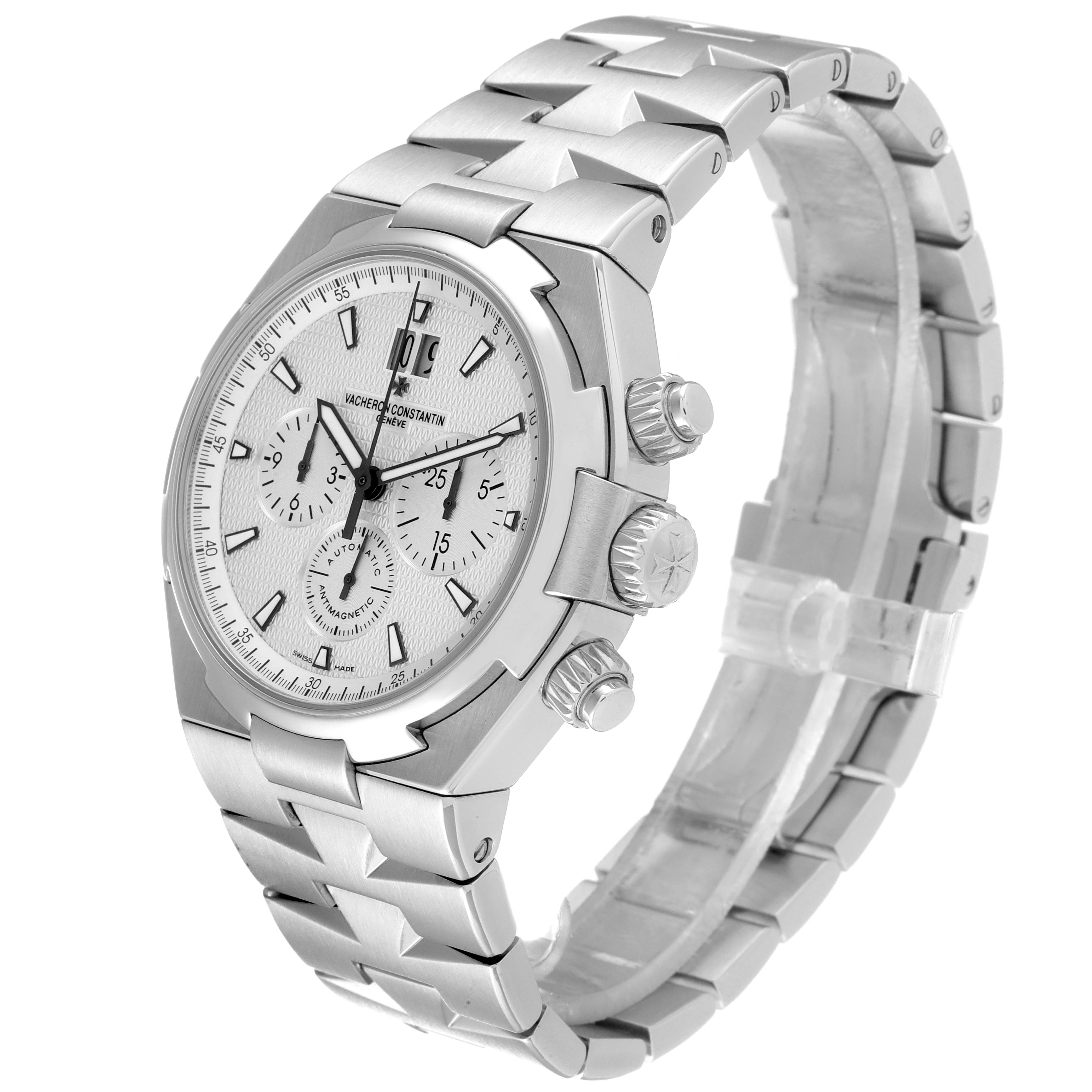 The image shows a Vacheron Constantin Overseas 49150/B01A-9095 Men's Stainless Steel Silver Dial 49150/B01A-9095 Men's Stainless Steel Silver Dial watch at a three-quarter angle, highlighting the face, bezel, and metal bracelet.