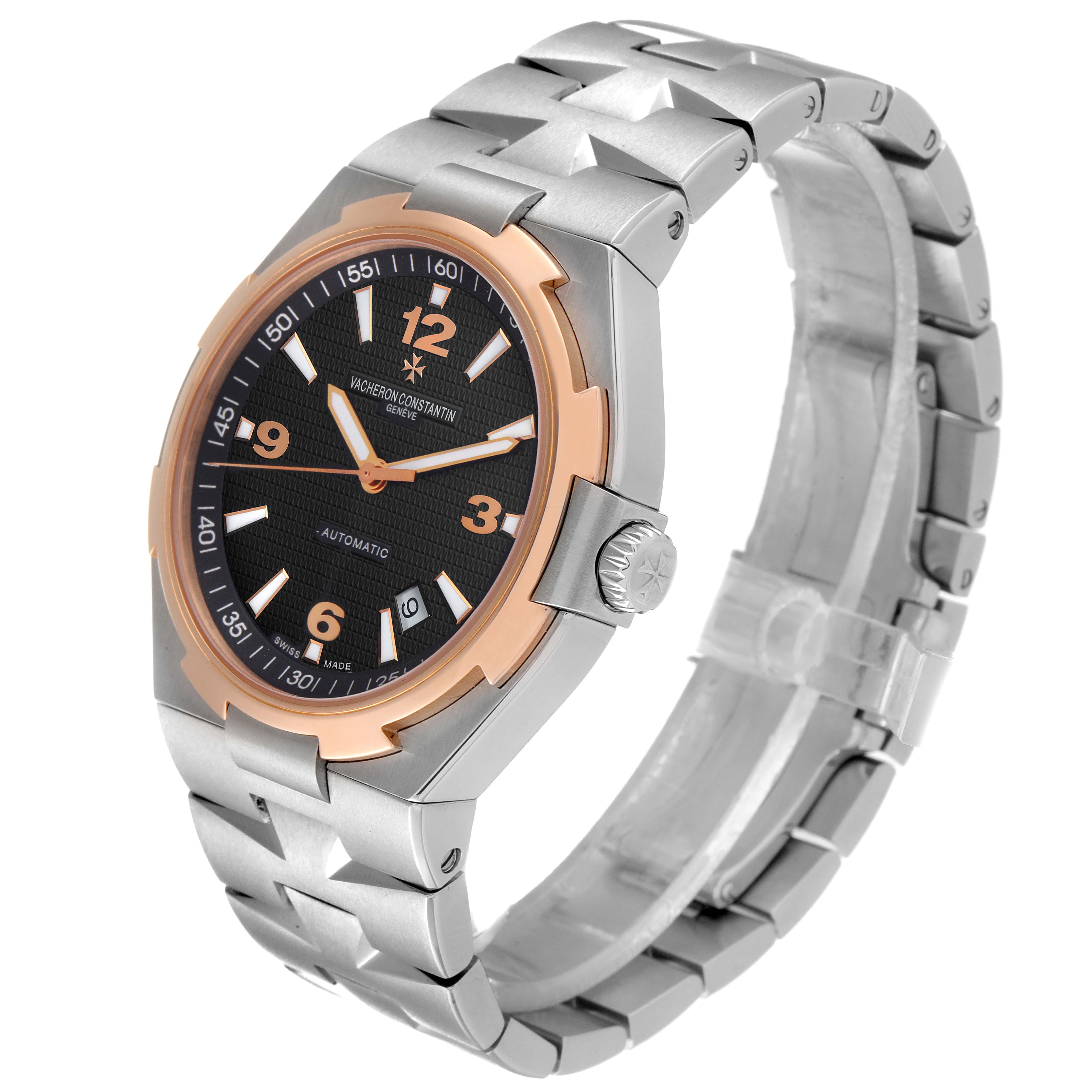 The Vacheron Constantin Overseas 47040/B01A-9094 Men's Stainless Steel Black Dial 47040/B01A-9094 Men's Stainless Steel Black Dial watch is shown from a three-quarter angle, highlighting the dial, bezel, crown, and bracelet.