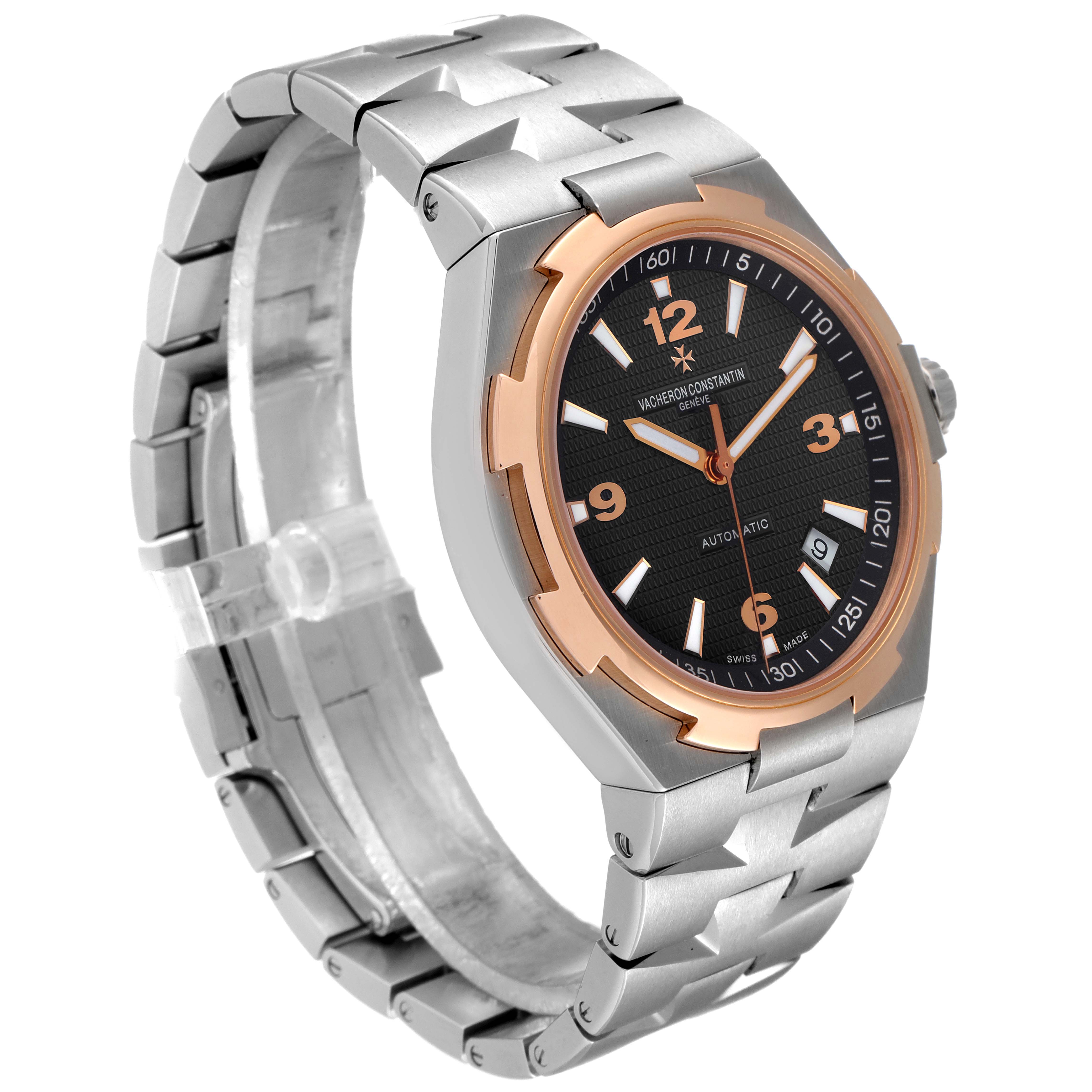 The image shows a Vacheron Constantin Overseas 47040/B01A-9094 Men's Stainless Steel Black Dial 47040/B01A-9094 Men's Stainless Steel Black Dial watch from an angle highlighting its face, bezels, and bracelet.