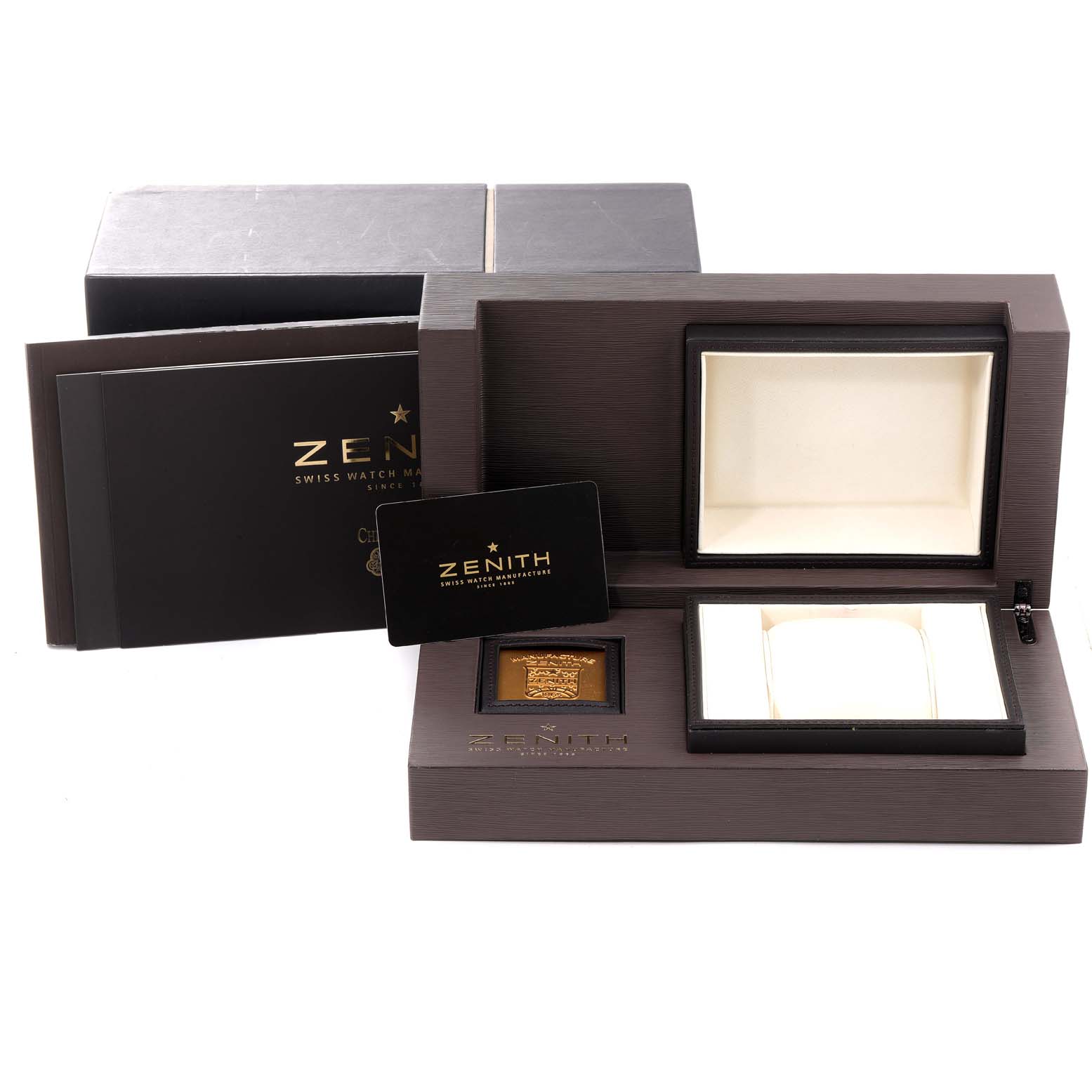 The image shows the open packaging and accessories for the Zenith Chronomaster 03.1260.4039/01C Men's Stainless Steel Silver Dial 03.1260.4039/01C Men's Stainless Steel Silver Dial watch, including its box, manual, and authenticity card.