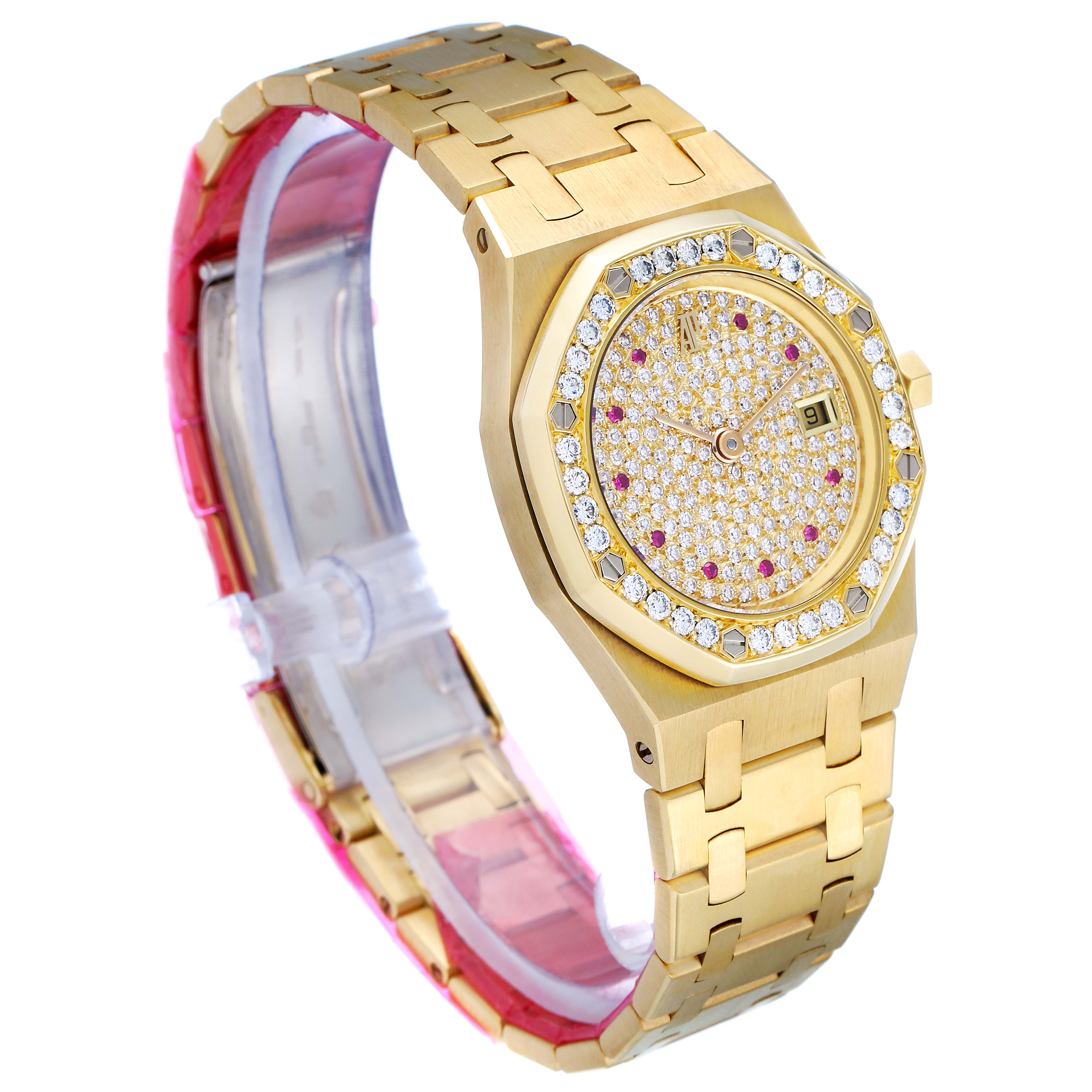 The image shows an Audemars Piguet Royal Oak 14587BA.Z.0902BA.01 Women
s Yellow Gold Champagne Dial 14587BA.Z.0902BA.01 Women
s Yellow Gold Champagne Dial watch from a front angle, displaying the dial, bezel, and bracelet.