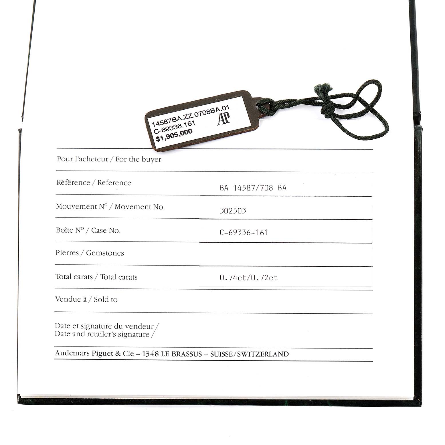 The image shows the tag and purchase details for a Royal Oak model by Audemars Piguet, displayed flat on the paper.
