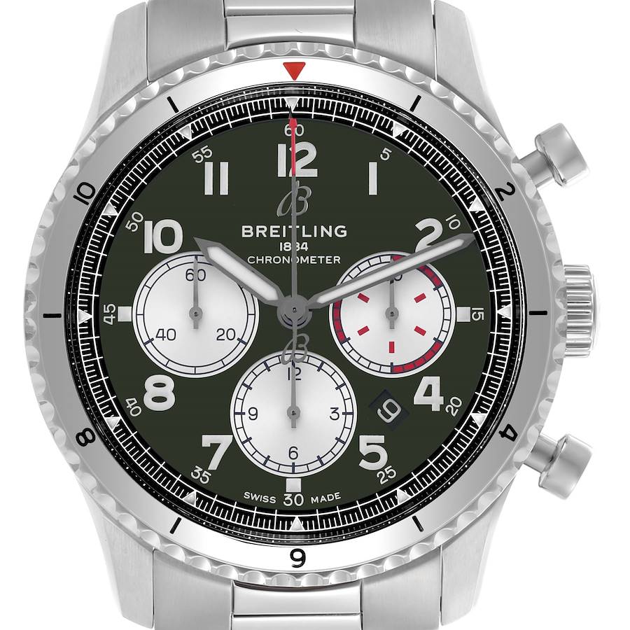 The Breitling Aviator watch is shown from a top-down angle, displaying the dial, chronograph subdials, bezel, and side pushers.