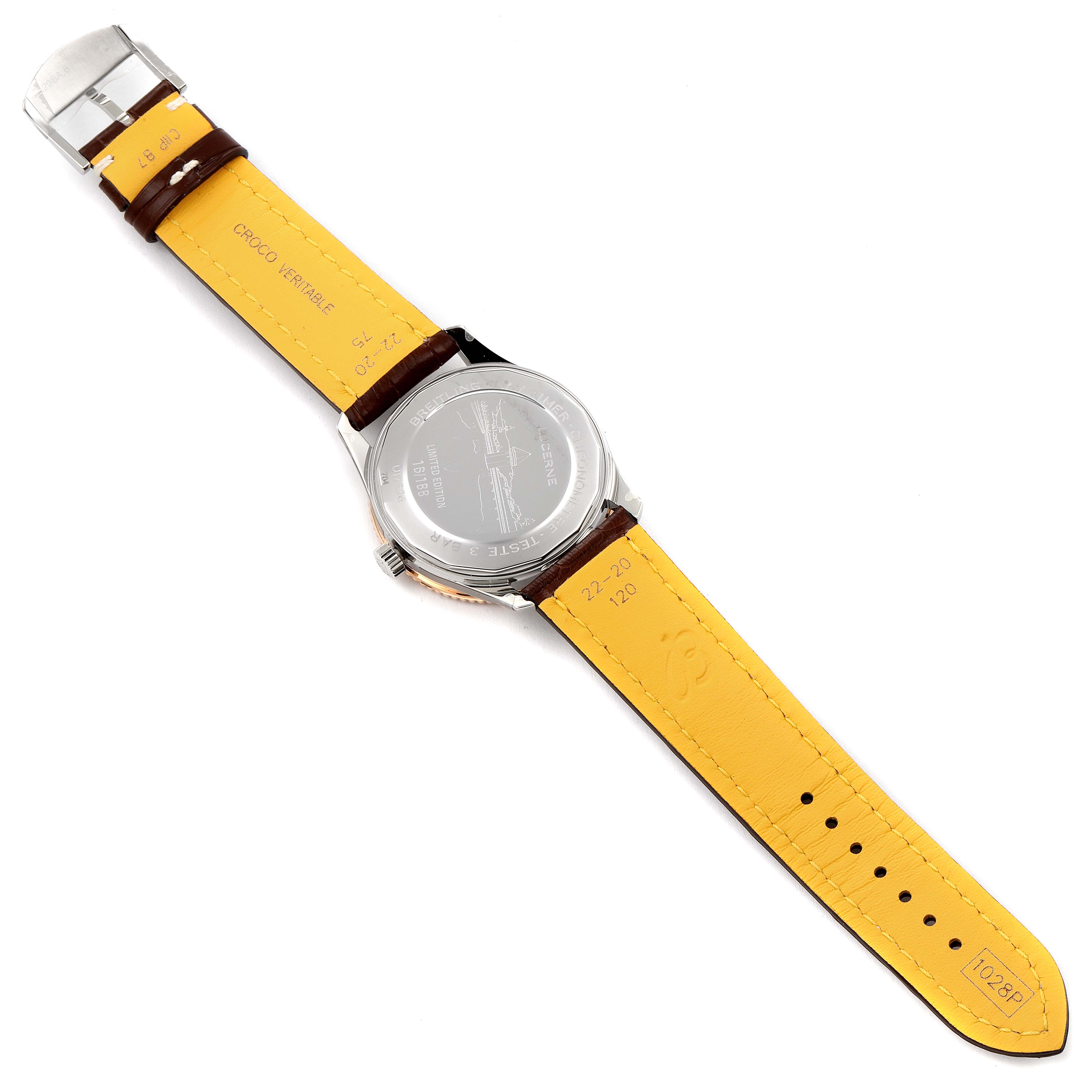 The image shows the back view of a Breitling Navitimer U17326211M1P1 Men's Stainless Steel Grey Dial U17326211M1P1 Men's Stainless Steel Grey Dial watch, highlighting the yellow inner strap and case back.