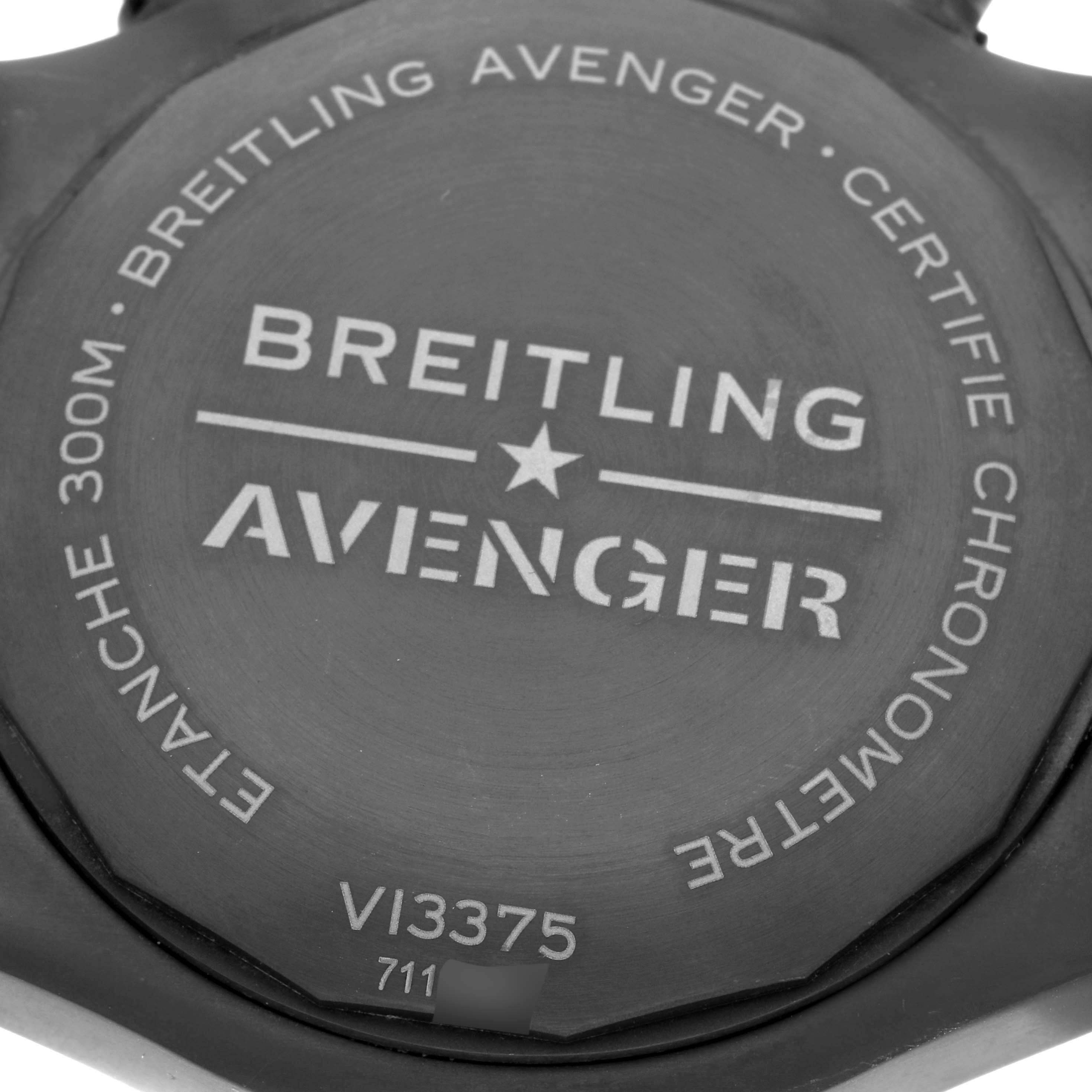 The image shows the back casing of a Breitling Avenger V13375101C1X1 Men's Titanium Blue Dial watch, displaying engraved branding and specifications.