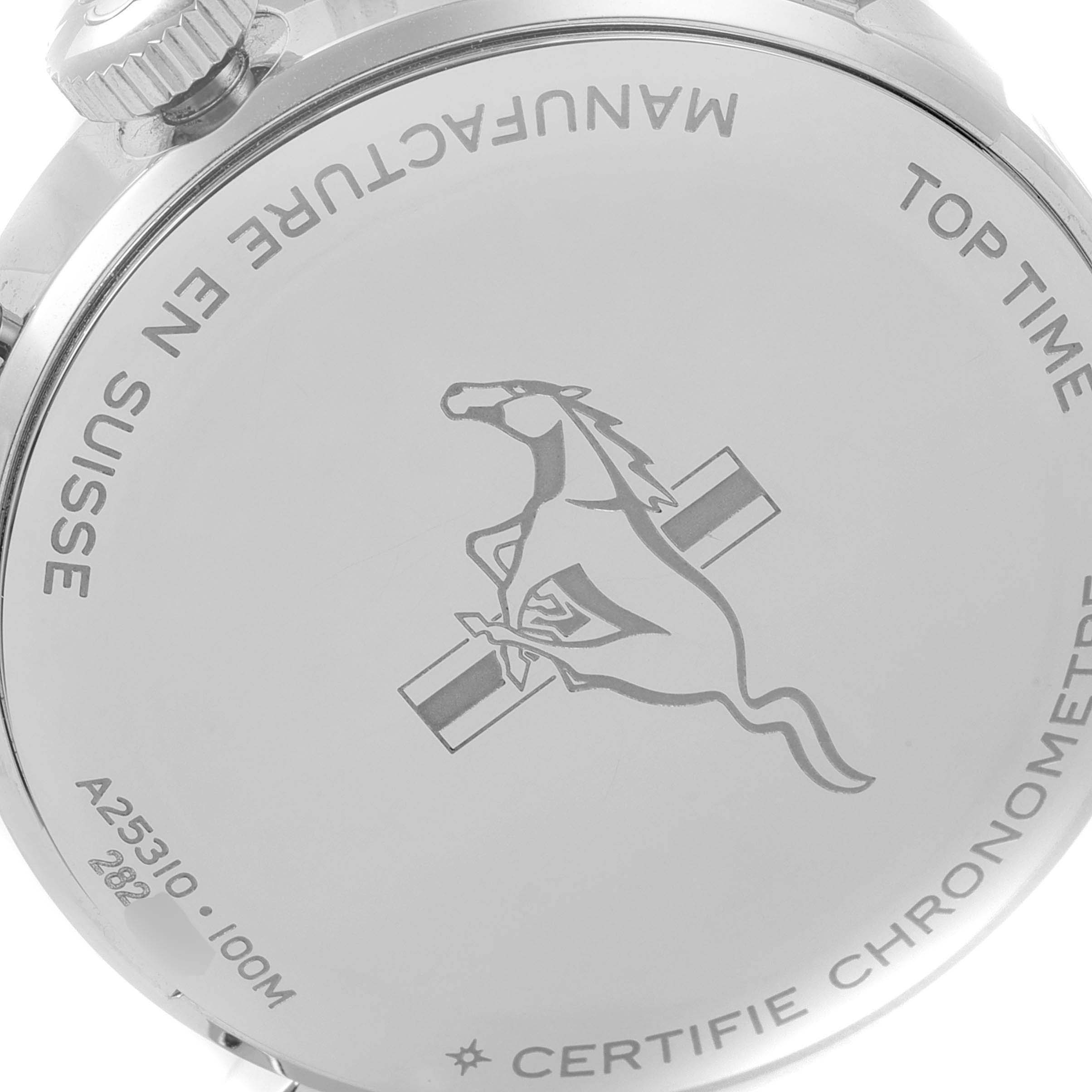 The image shows the back case of the Breitling Top Time Limited Series watch with engraved details and a depiction of a horse.