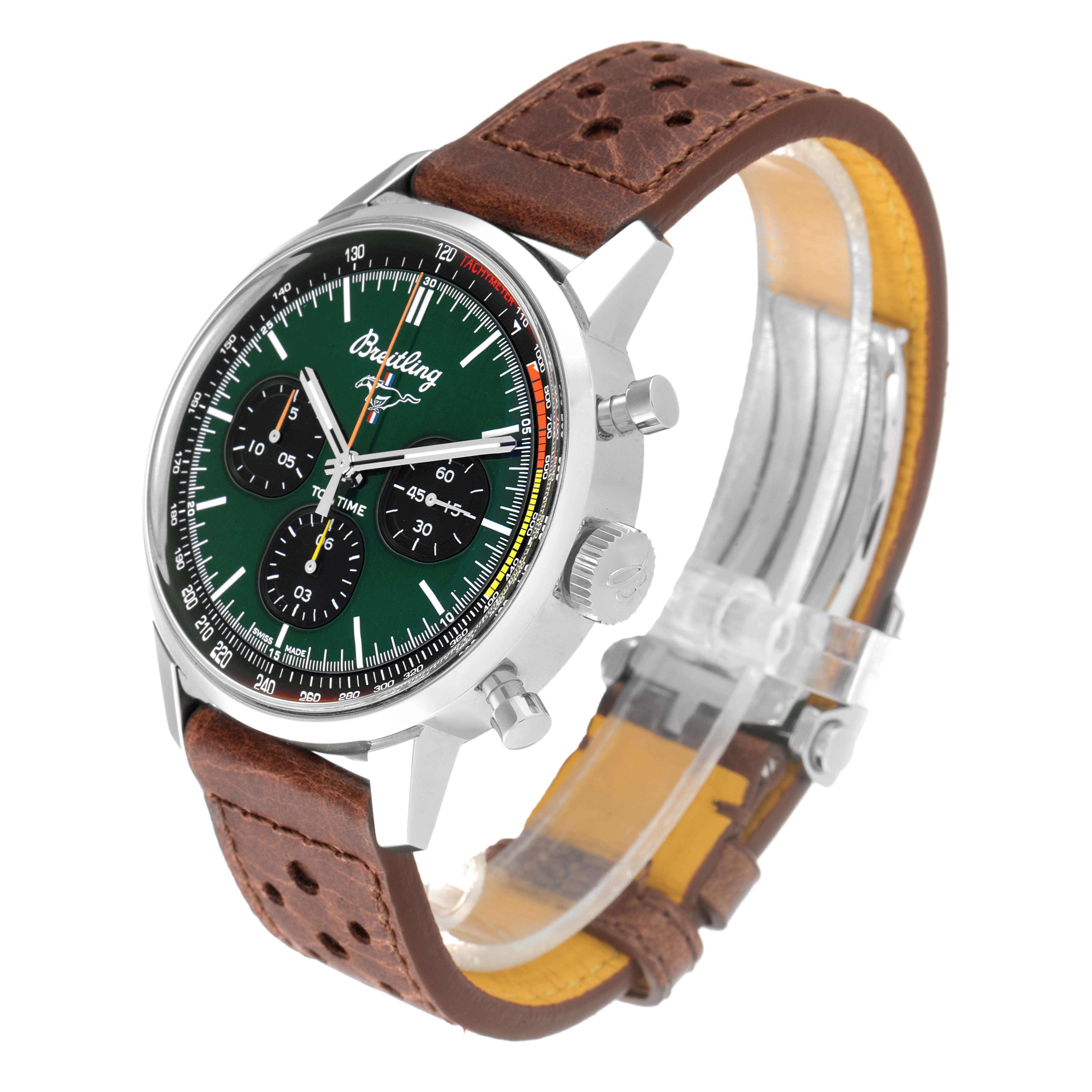 The image shows a side-angle view of a Breitling Limited Series watch, featuring a green dial, brown leather strap, and chrono pushers.