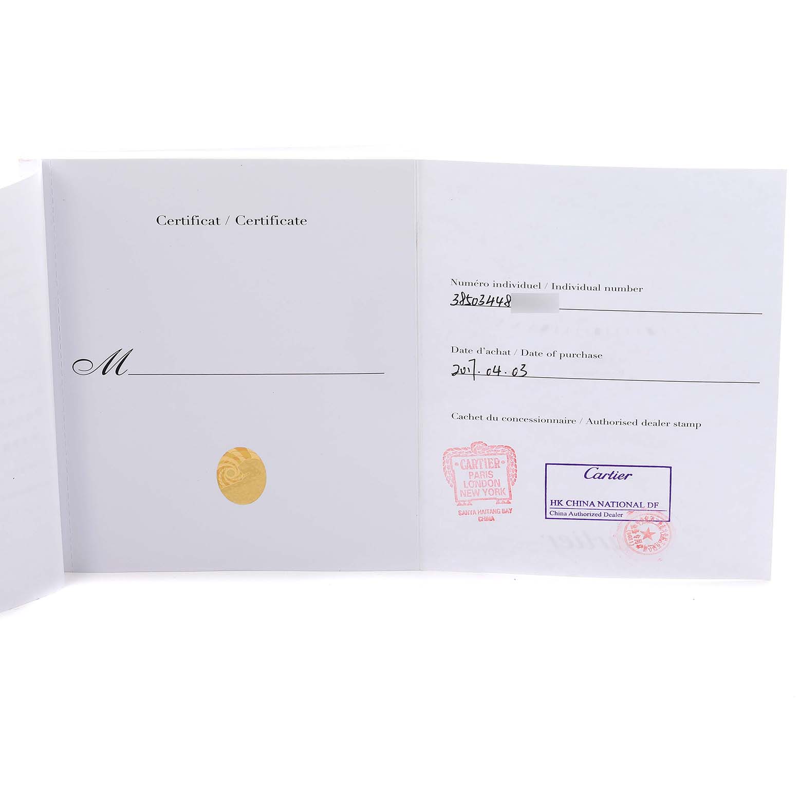 The image shows a Cartier Clé model certificate with purchase details and dealer stamps.