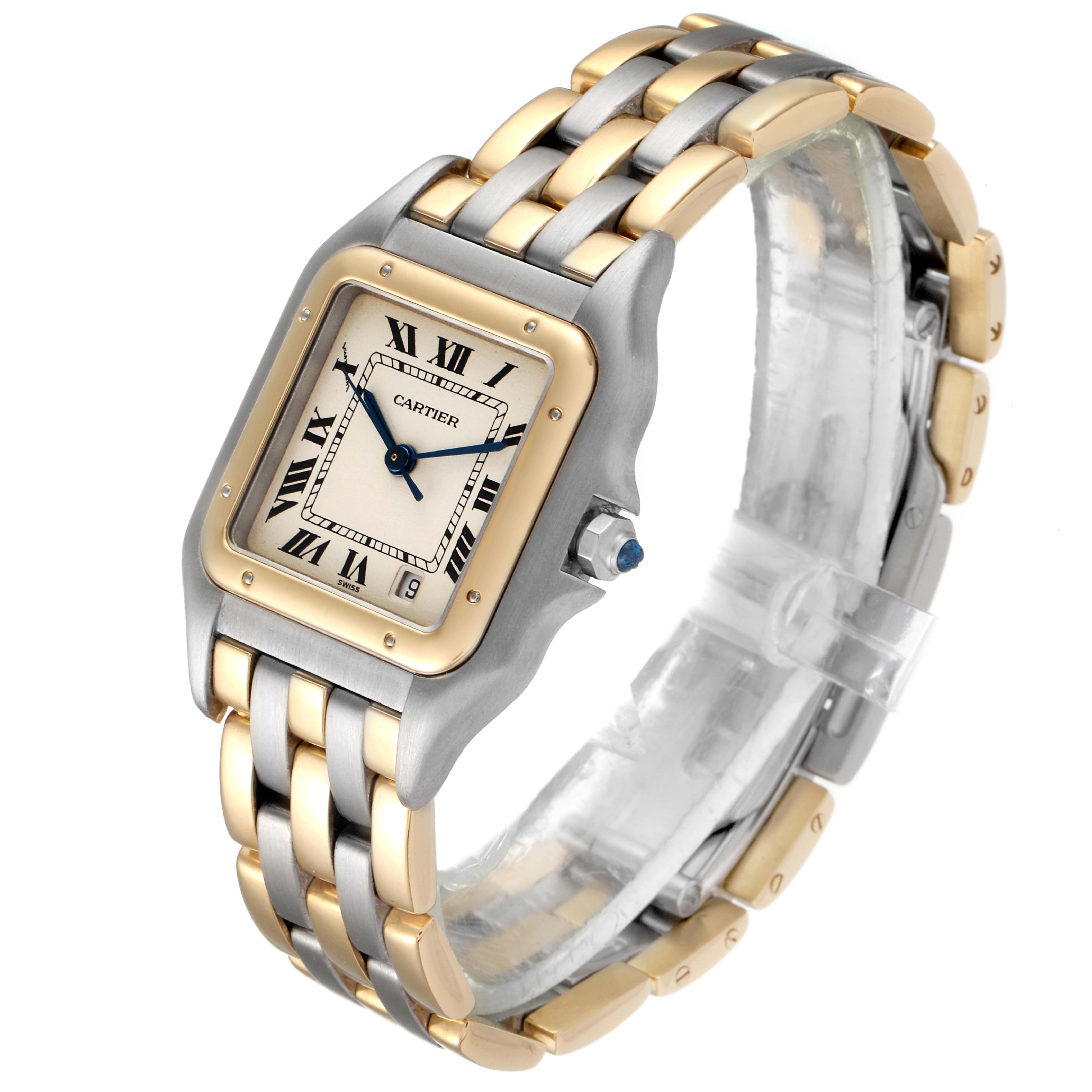 The Cartier Panthere W25028B6 Women
s Steel and Gold (two tone) Silver Dial W25028B6 Women
s Steel and Gold (two tone) Silver Dial watch is shown at an angle showcasing its square face, two-tone bracelet, and crown.