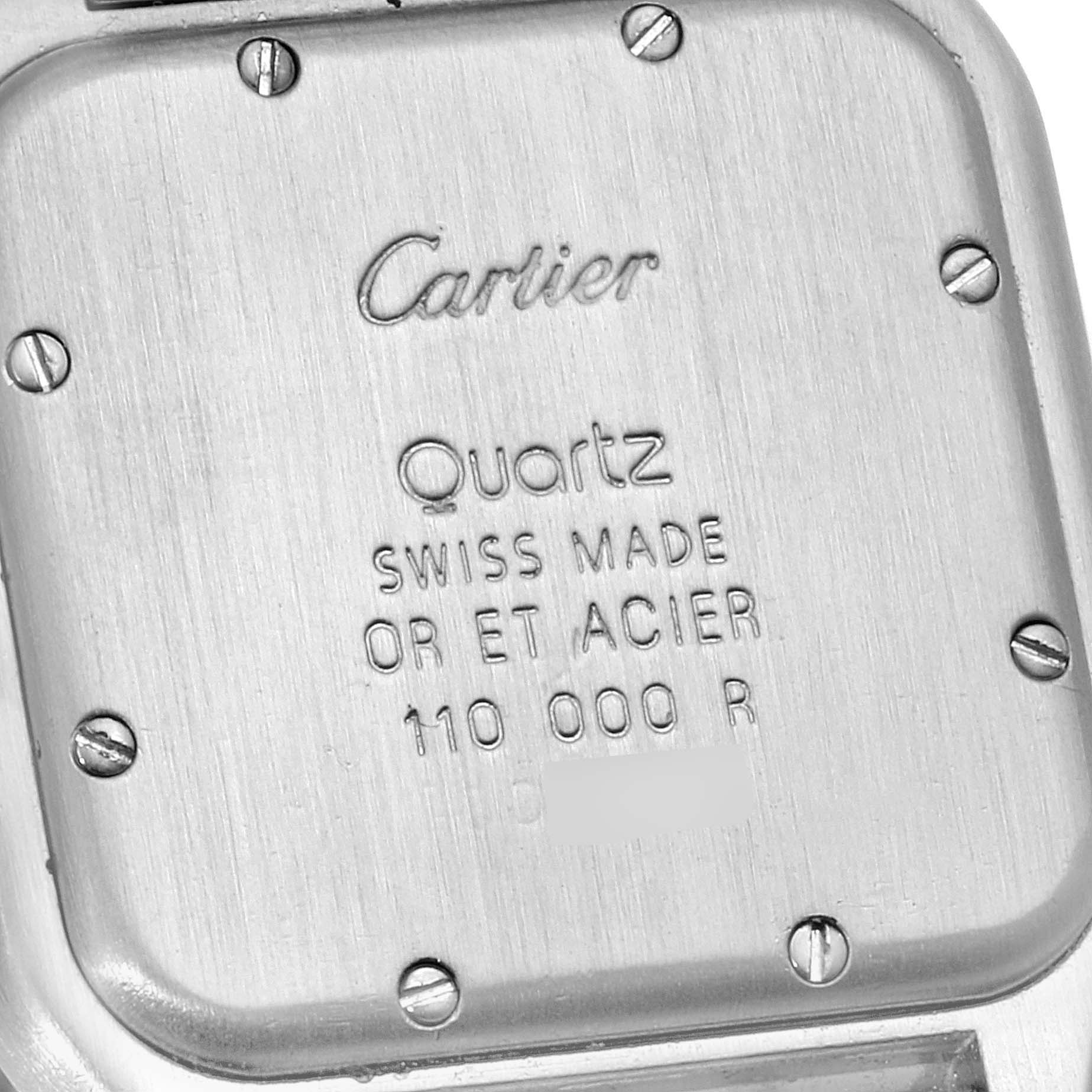 The image shows the back case of a Cartier Panthere W25028B6 Women
s Steel and Gold (two tone) Silver Dial W25028B6 Women
s Steel and Gold (two tone) Silver Dial watch, highlighting the brand engraving and specifications.