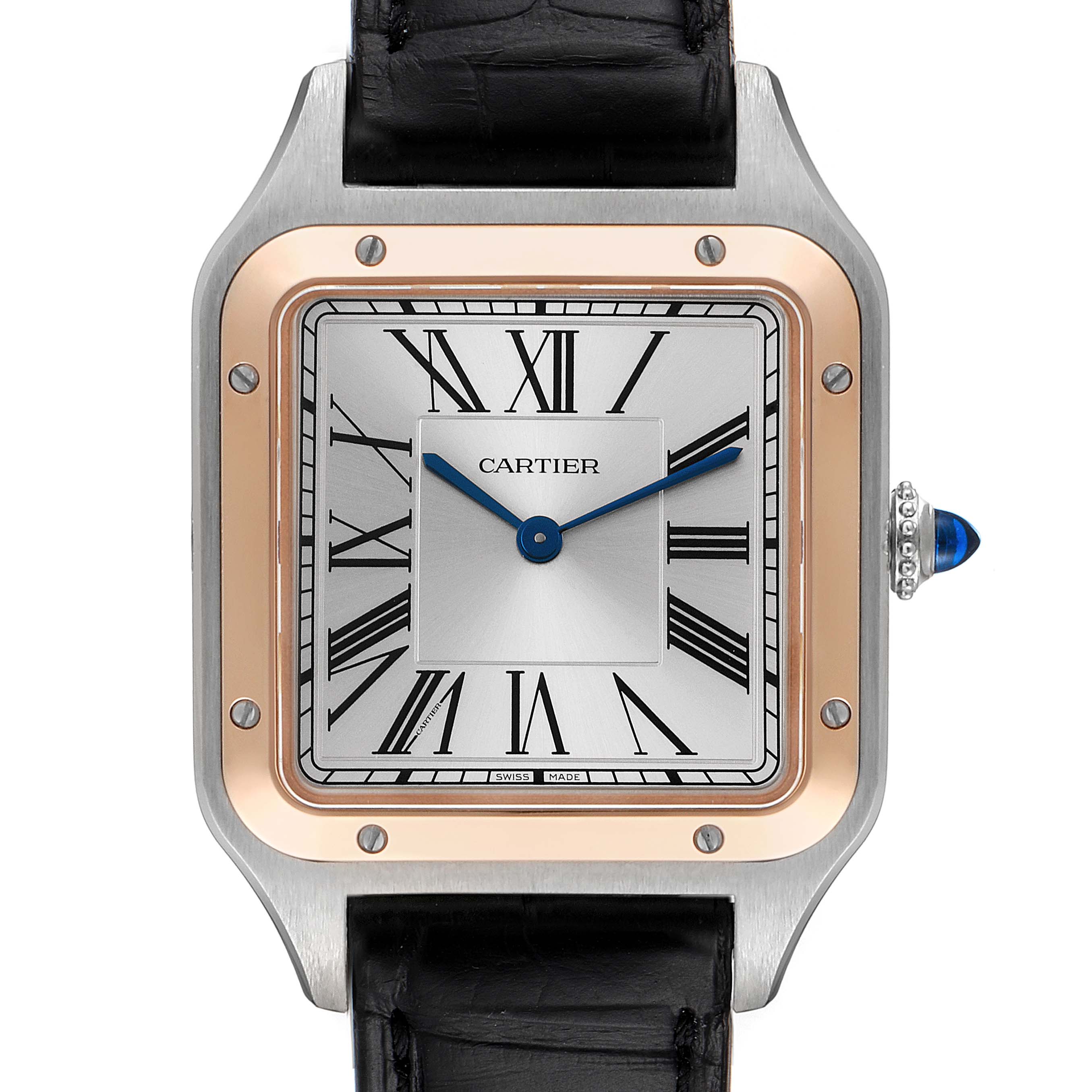 The image shows a frontal view of a Cartier Santos Dumont W2SA0011 Men's Steel and Gold (two tone) Silver Dial W2SA0011 Men's Steel and Gold (two tone) Silver Dial watch with a silver dial, blue hands, and a black leather strap.