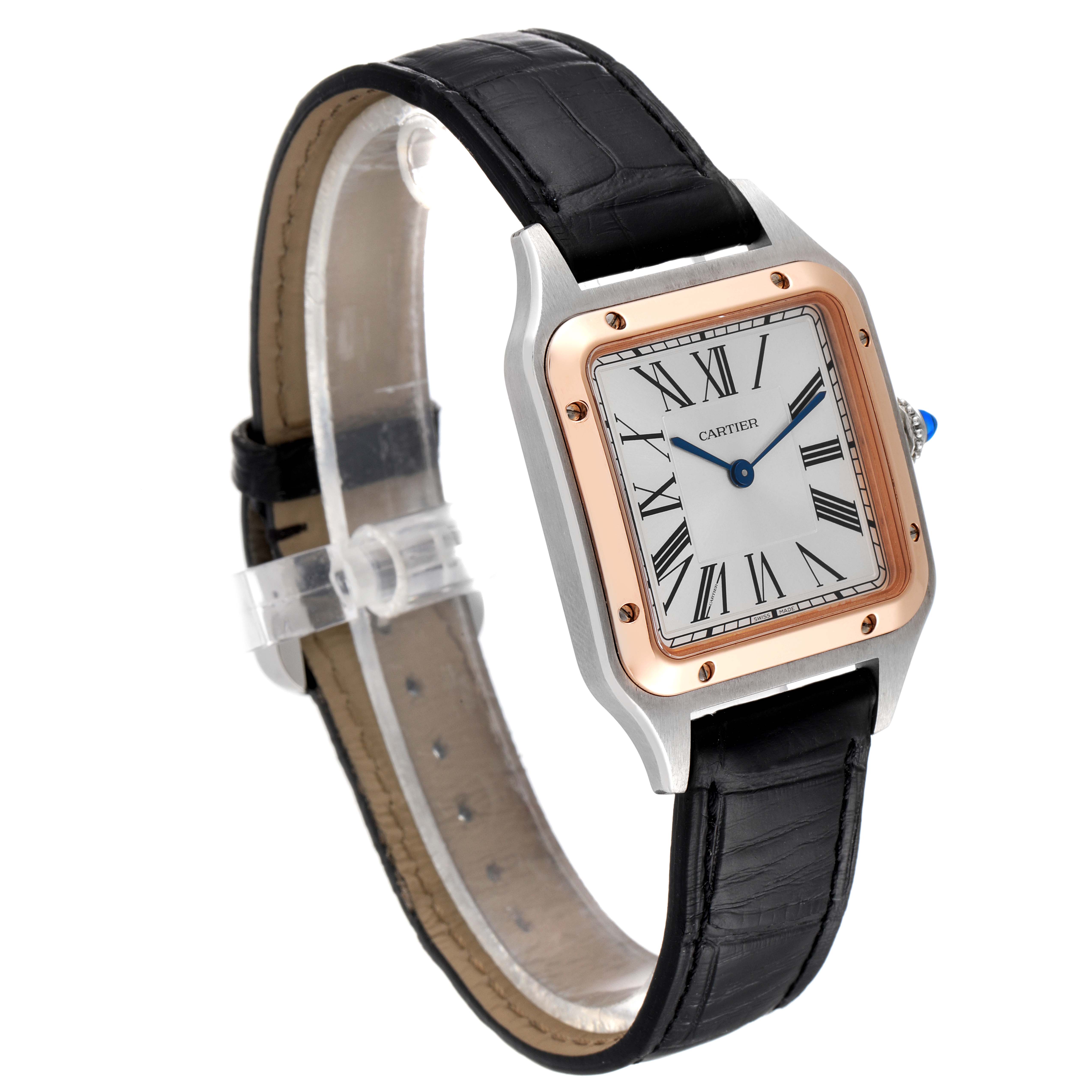 The Santos Dumont by Cartier watch is shown at a slight angle, displaying its square face, Roman numerals, and black leather strap.