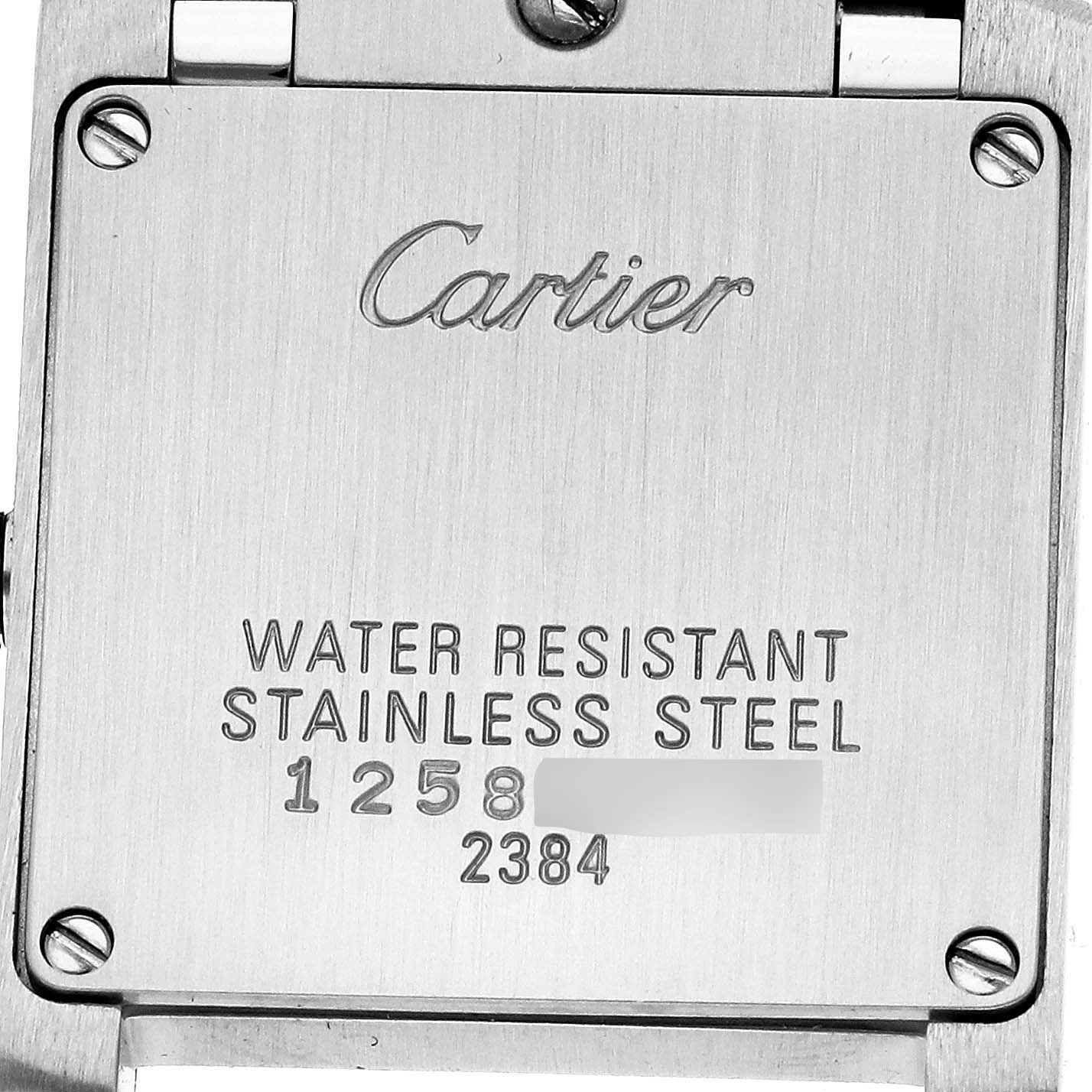 The image shows the back of a Cartier Tank Francaise W51008Q3 Women's Stainless Steel Silver Dial W51008Q3 Women's Stainless Steel Silver Dial, highlighting its stainless steel and water resistant markings.