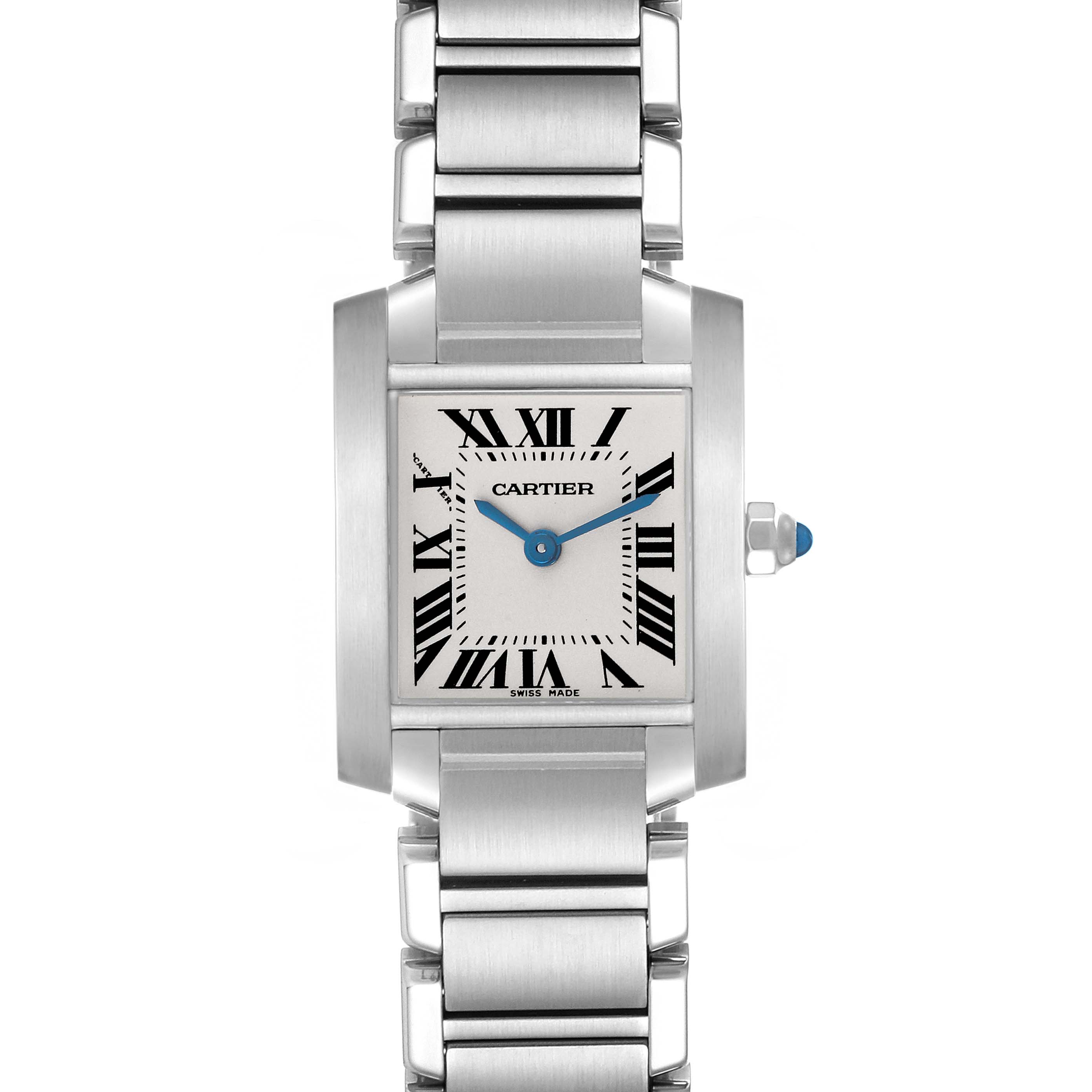 The Cartier Tank Française watch is shown from a top view, highlighting the face, Roman numerals, and metal bracelet.