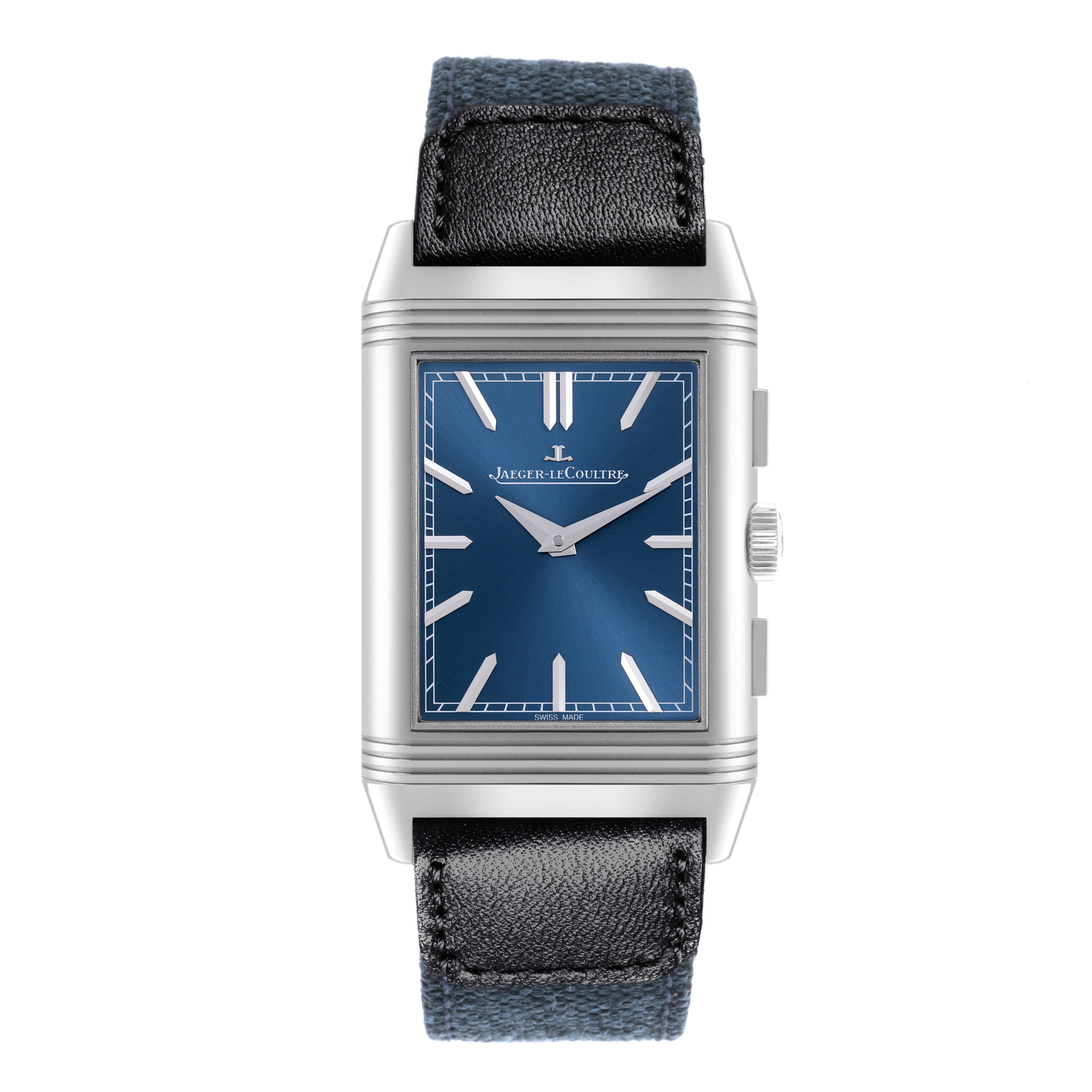 The Jaeger-LeCoultre Reverso watch is shown from a top-down view, highlighting the blue dial, case, crown, and leather strap.