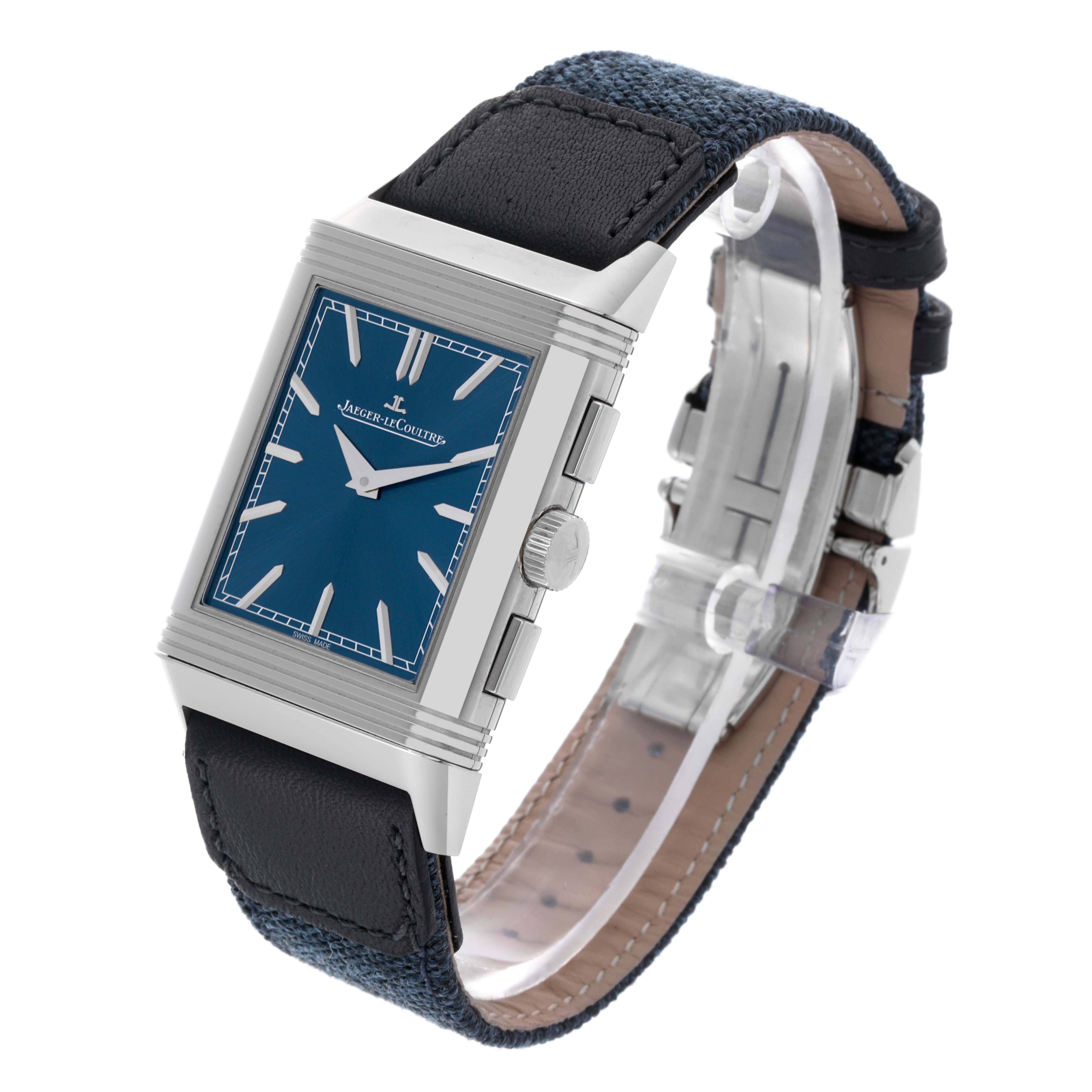 The Jaeger-LeCoultre Reverso watch is shown at a slight angle, displaying the face, case profile, and leather strap.
