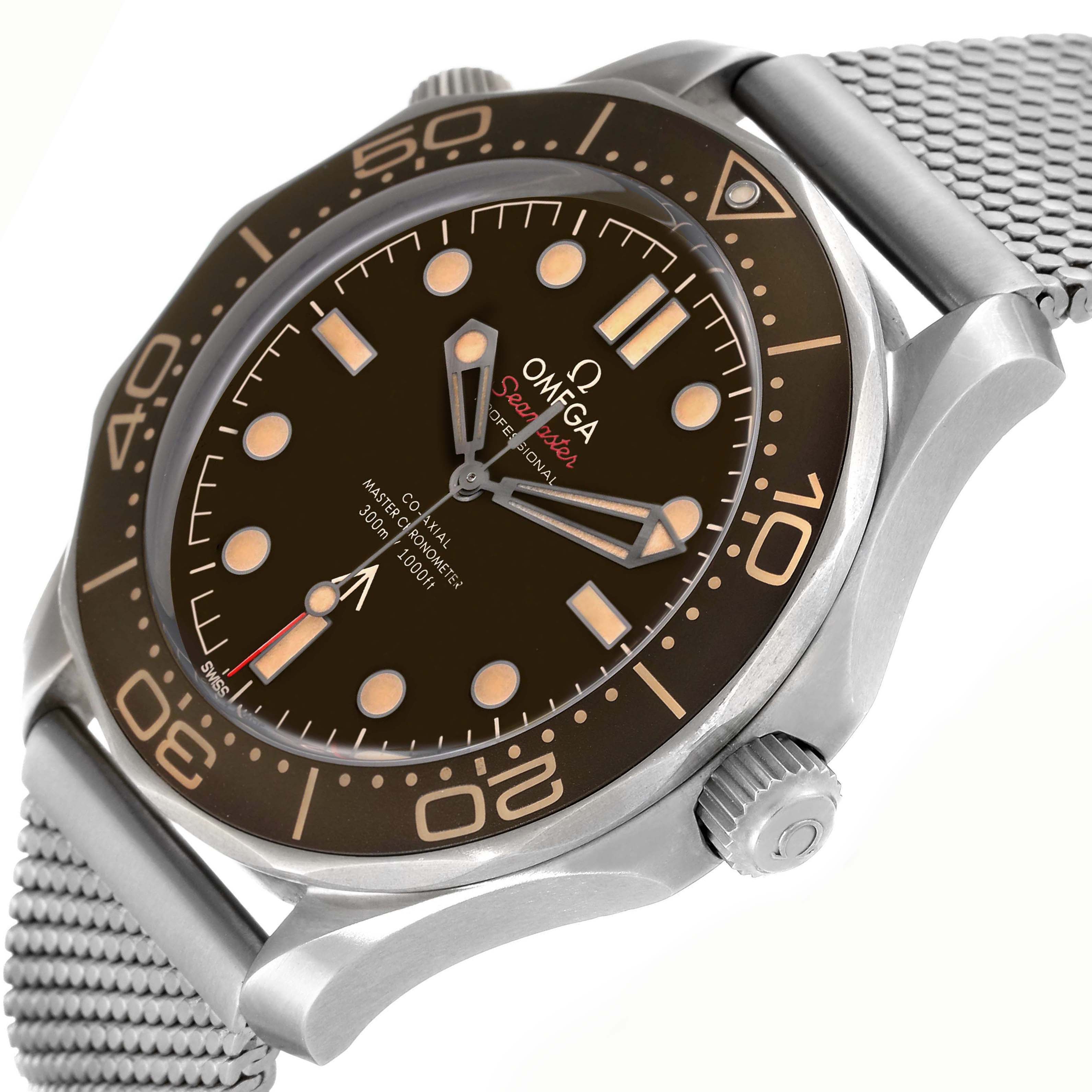 The Omega Seamaster 210.90.42.20.01.001 Men's Titanium Brown Dial 210.90.42.20.01.001 Men's Titanium Brown Dial watch is shown at an angled view, displaying the dial, bezel, crown, and mesh strap.