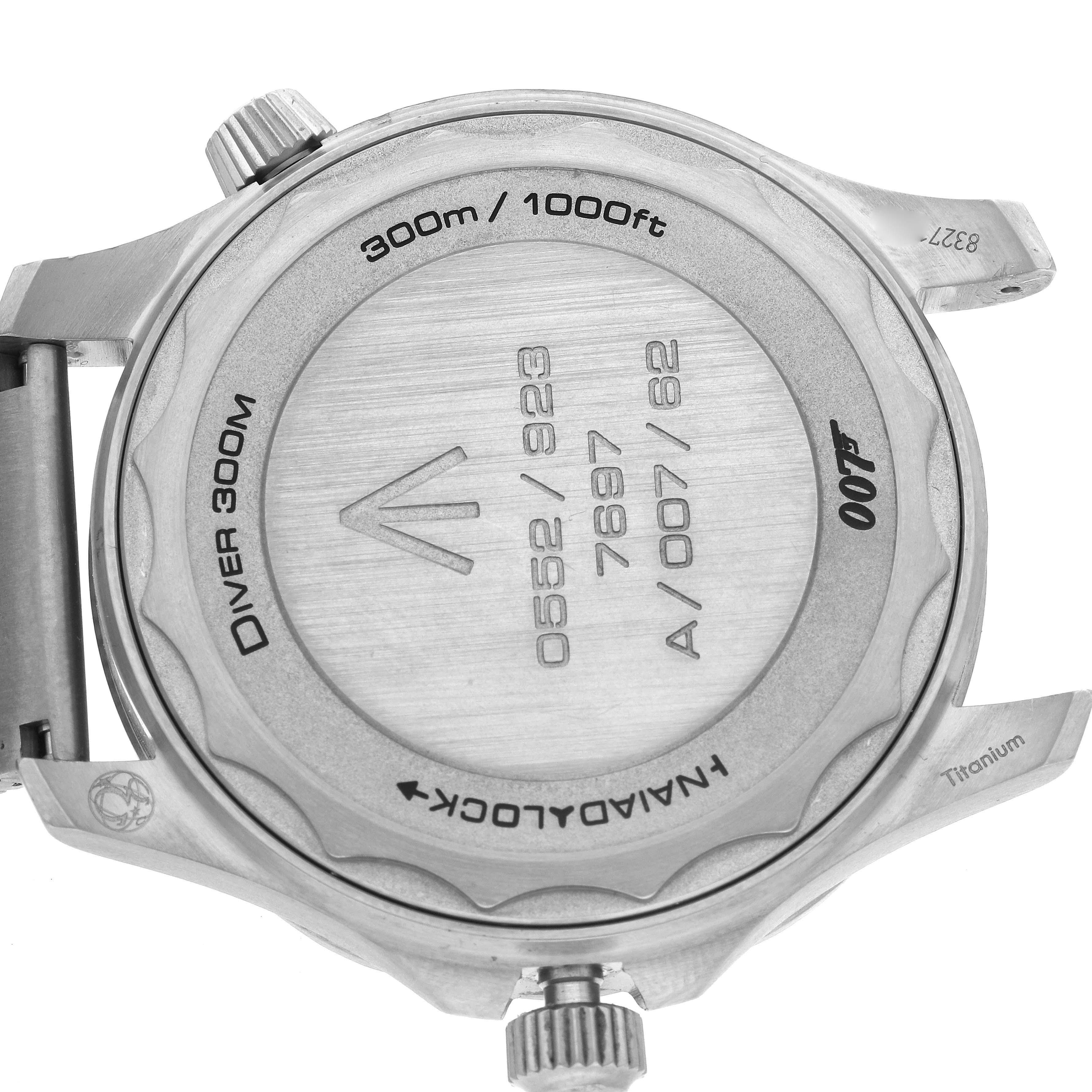 The image shows the back of an Omega Seamaster 210.90.42.20.01.001 Men's Titanium Brown Dial 210.90.42.20.01.001 Men's Titanium Brown Dial watch with engravings and a view of the crown and lugs.