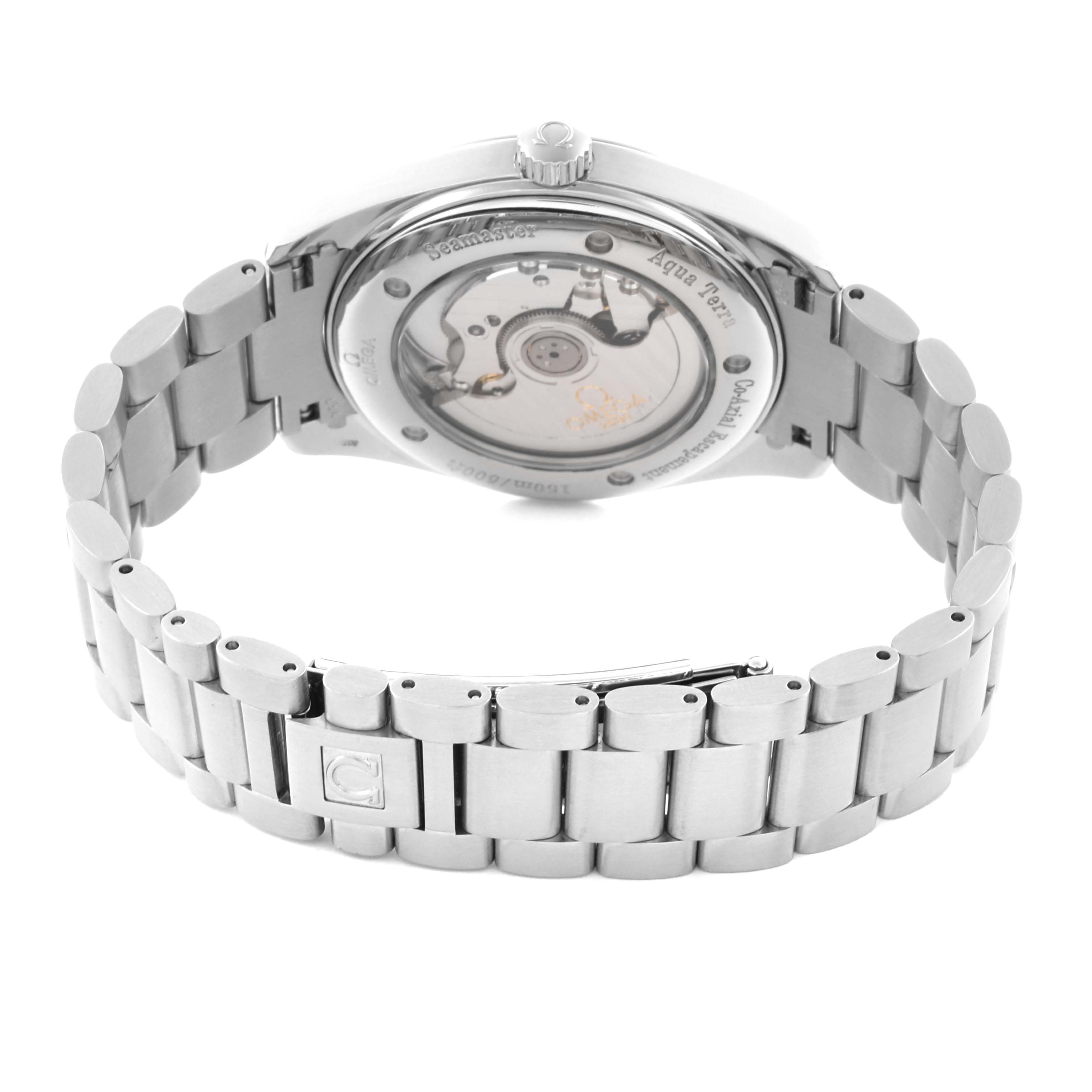 The image shows the back view of an Omega Aqua Terra 2503.33.00 Men's Stainless Steel Silver Dial 2503.33.00 Men's Stainless Steel Silver Dial watch, displaying its transparent case back and metal bracelet.