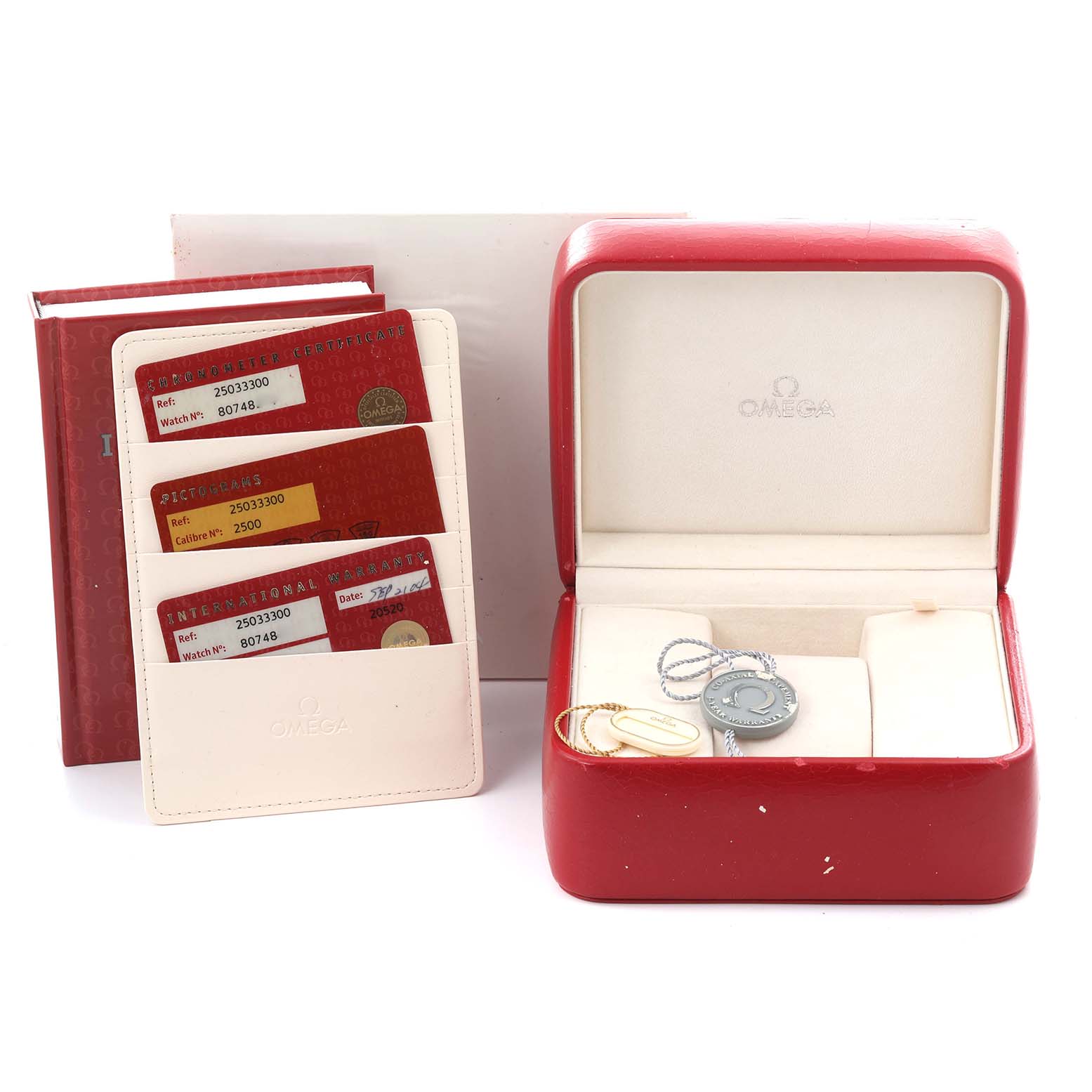 The image shows the packaging and accessories of an Omega Aqua Terra 2503.33.00 Men's Stainless Steel Silver Dial 2503.33.00 Men's Stainless Steel Silver Dial watch, including the box, guarantee cards, and tags.