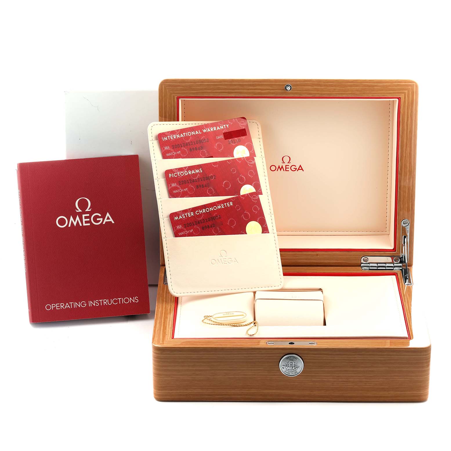 The image shows the Omega Aqua Terra 220.12.41.21.03.002 Men
s Stainless Steel Blue Dial 220.12.41.21.03.002 Men
s Stainless Steel Blue Dial watch
s packaging, including a wooden box, cards, and operating instructions.