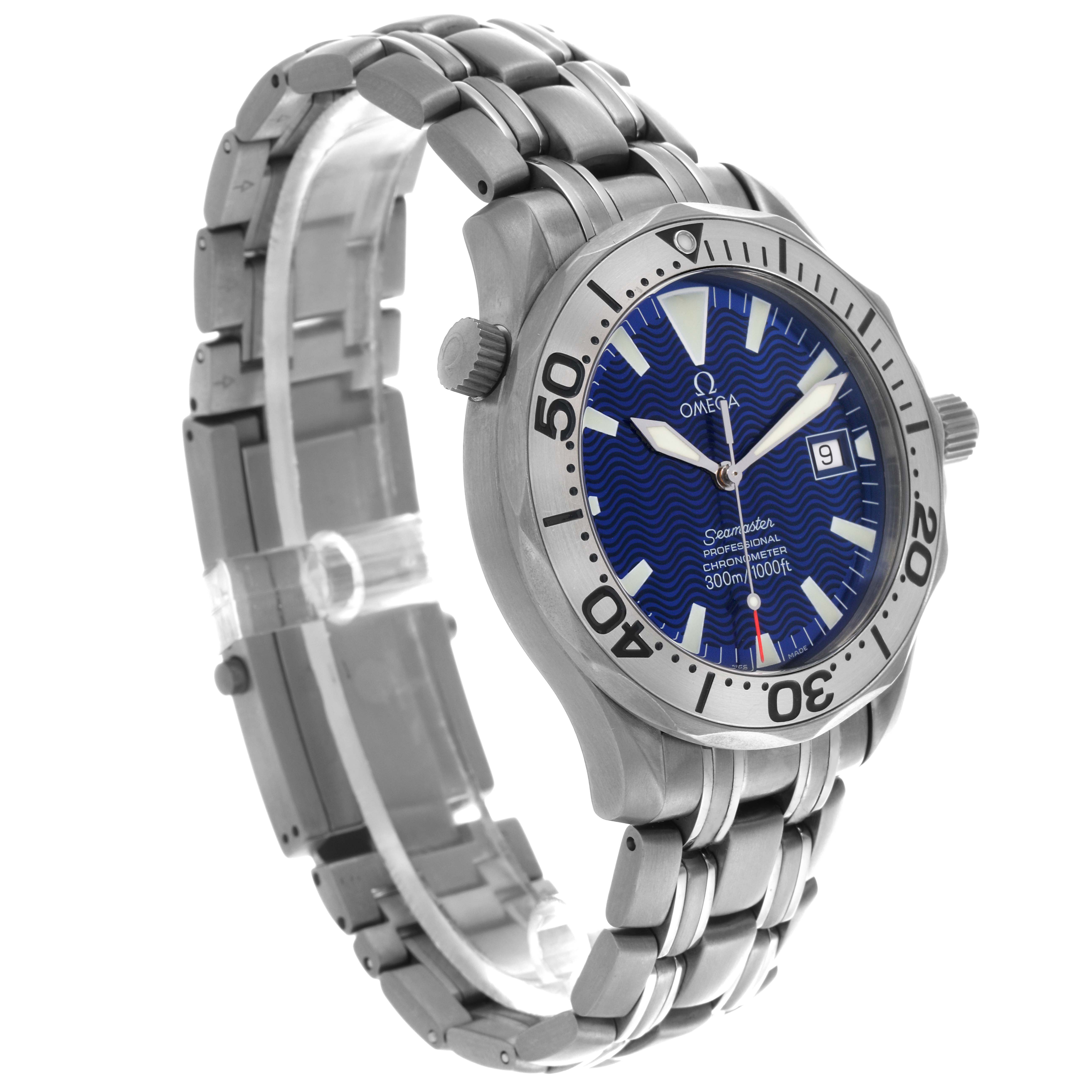 The image shows a side angle of the Omega Seamaster 2231.80.00 Men
s Titanium Blue Dial 2231.80.00 Men
s Titanium Blue Dial watch, highlighting its blue dial, bezel, and stainless steel bracelet.