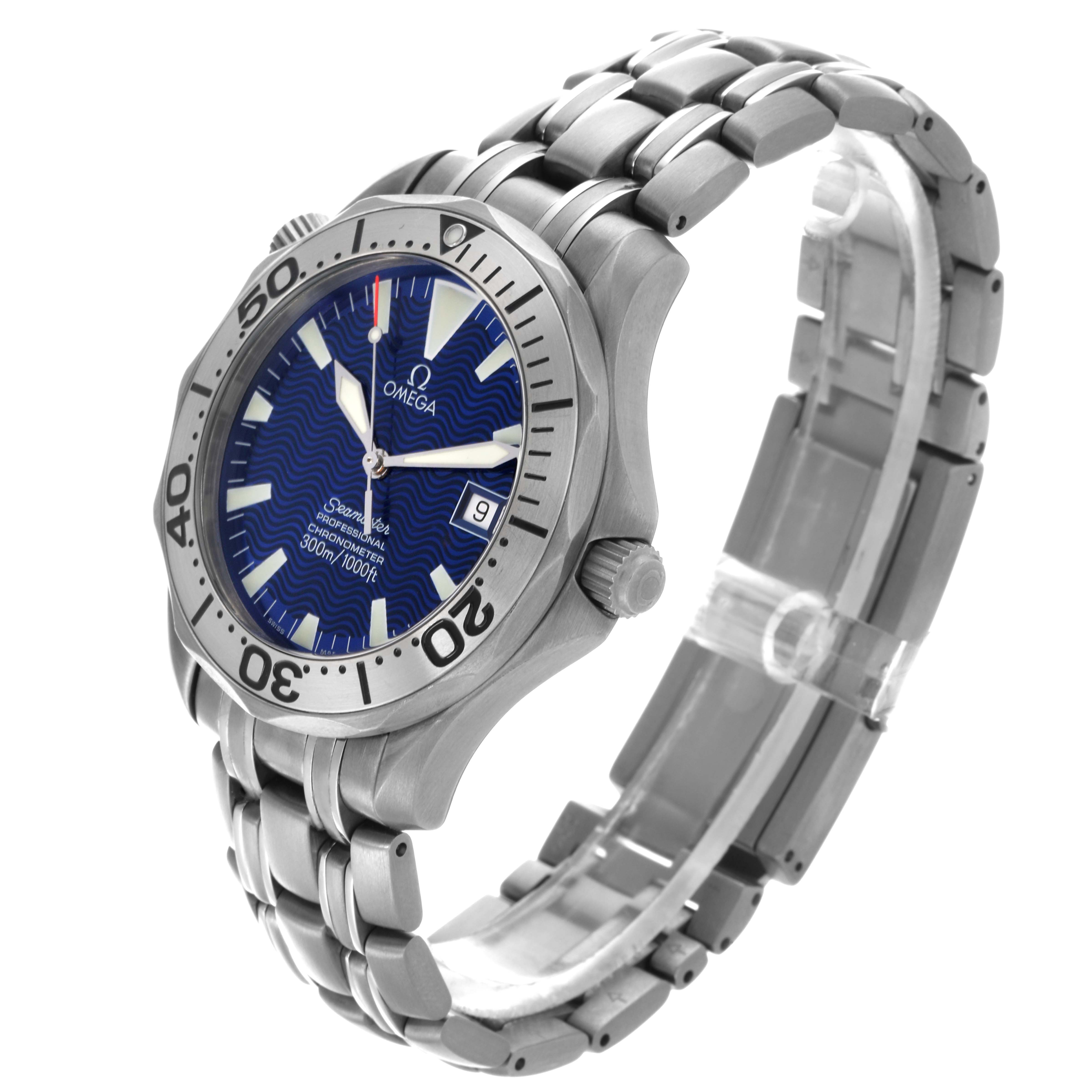 The Omega Seamaster 2231.80.00 Men
s Titanium Blue Dial 2231.80.00 Men
s Titanium Blue Dial watch is shown at an angled side view, highlighting the bezel, dial, crown, and bracelet.