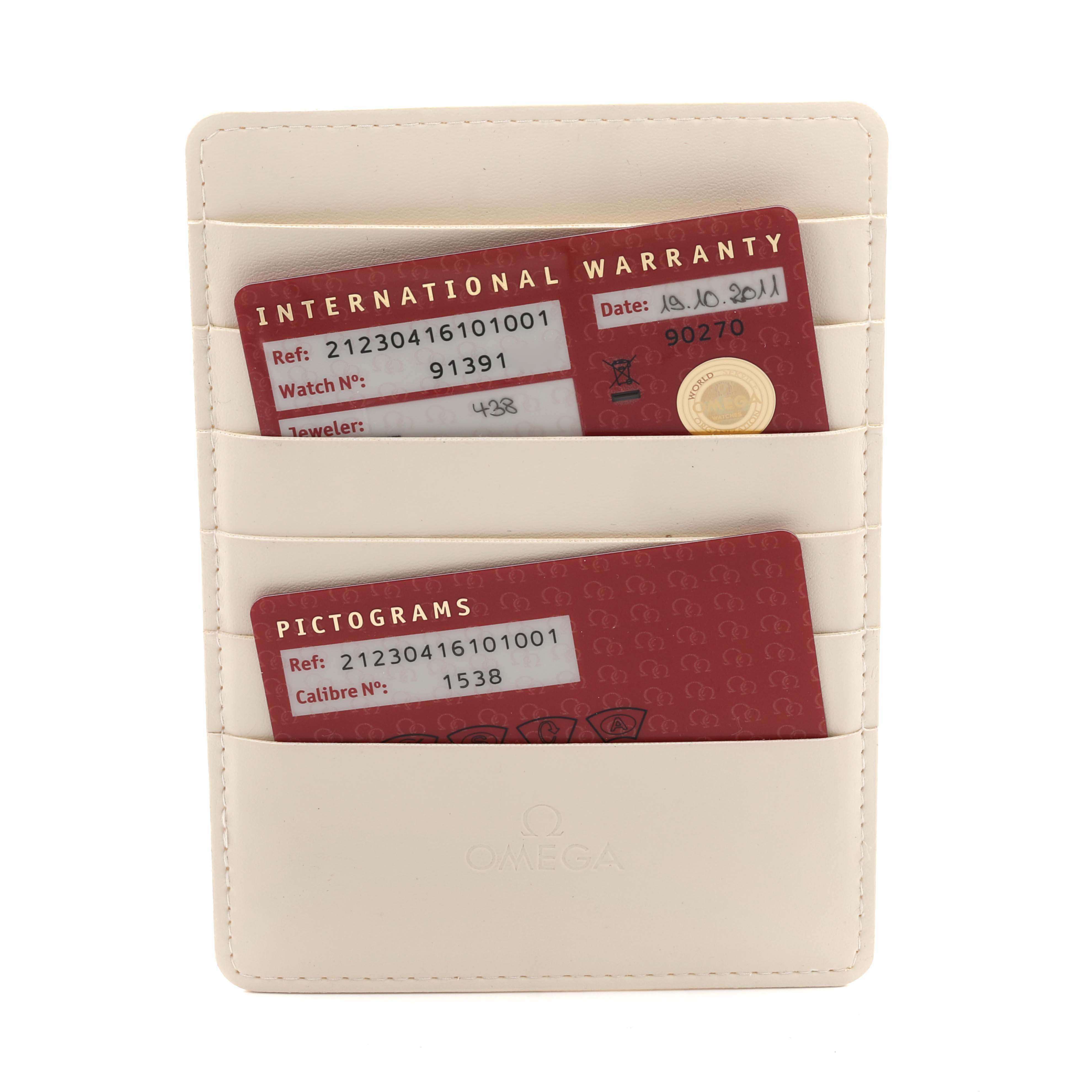 The image shows the warranty and pictogram cards for the Omega Seamaster 212.30.41.61.01.001 Men
s Stainless Steel Black Dial 212.30.41.61.01.001 Men
s Stainless Steel Black Dial, angled frontally in a cream cardholder.