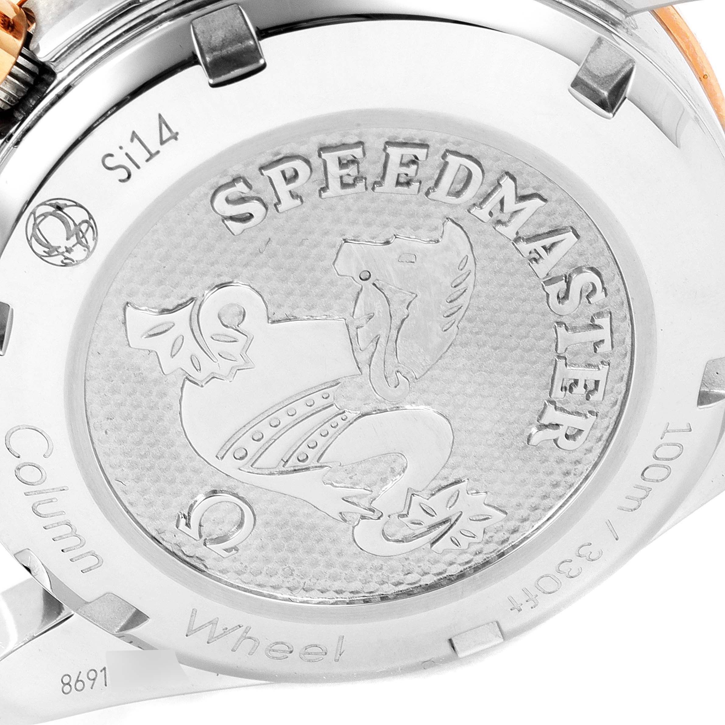 The image shows the case back of an Omega Speedmaster 324.23.38.50.02.002 Men's Steel and Gold (two tone) Silver Dial 324.23.38.50.02.002 Men's Steel and Gold (two tone) Silver Dial watch, featuring engravings and the Speedmaster logo.