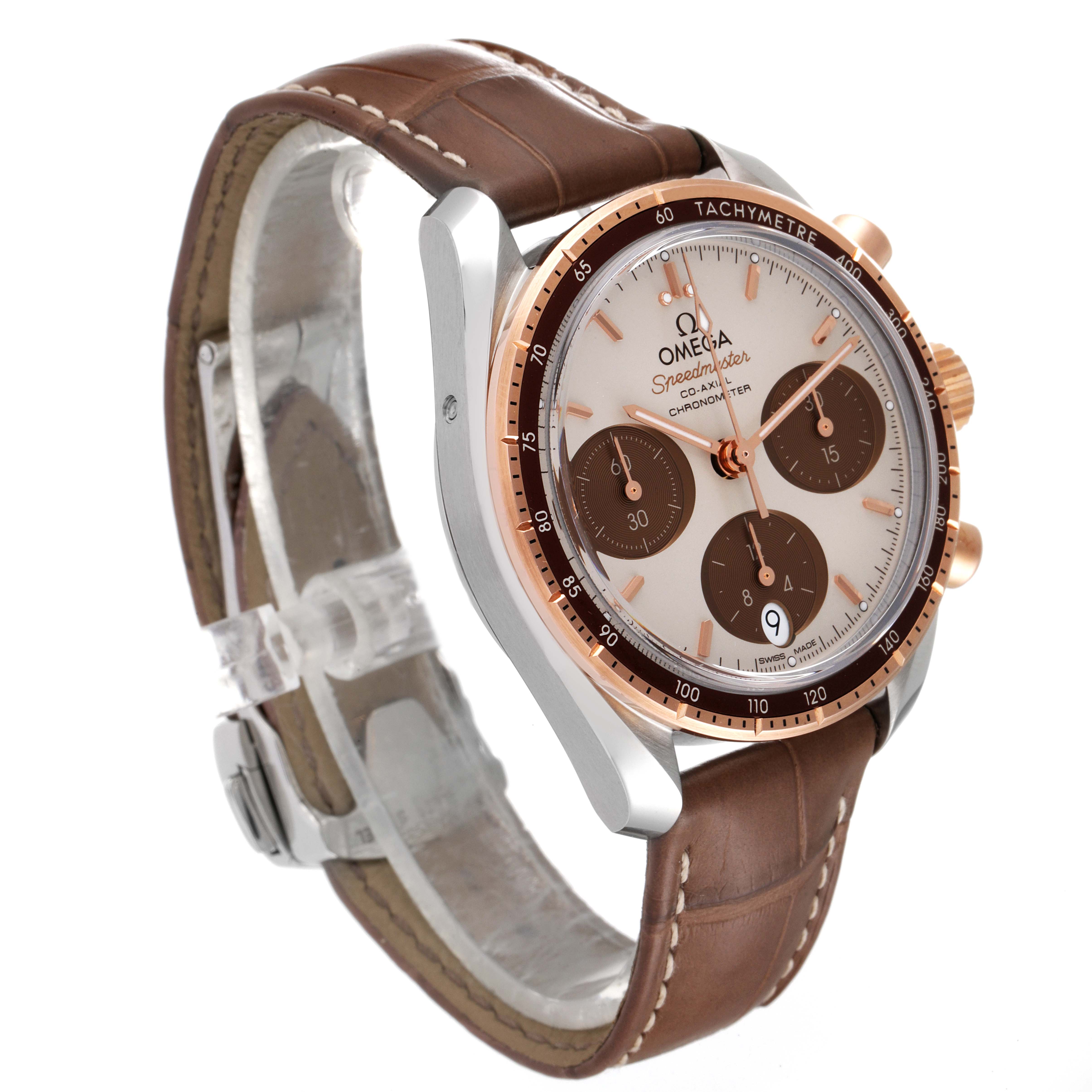 The image shows a side and front angle of the Omega Speedmaster 324.23.38.50.02.002 Men's Steel and Gold (two tone) Silver Dial 324.23.38.50.02.002 Men's Steel and Gold (two tone) Silver Dial watch, displaying its face, bezel, crown, and leather strap.